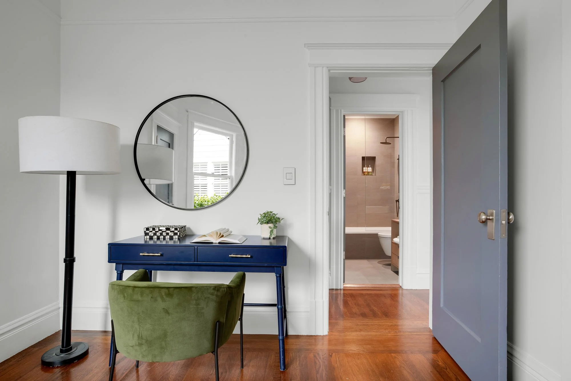 Original second parlor with original hardwood floors, crown molding, and access to the hallway bathroom with rain shower, luxury Presidio Heights Victorian flat, San Francisco