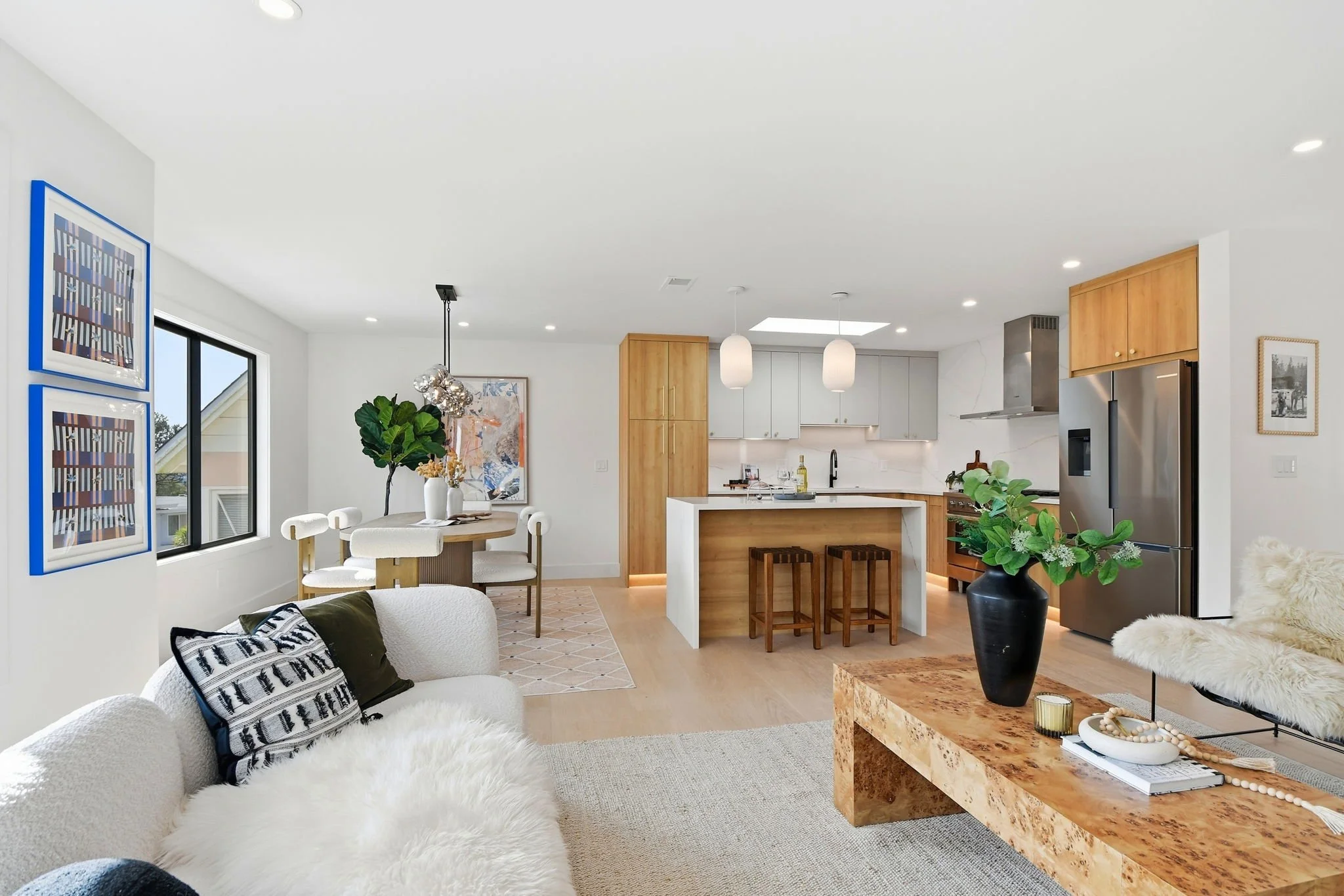 Expansive open-concept great room in a luxury San Francisco residence, seamlessly connecting the kitchen, dining, and living areas.