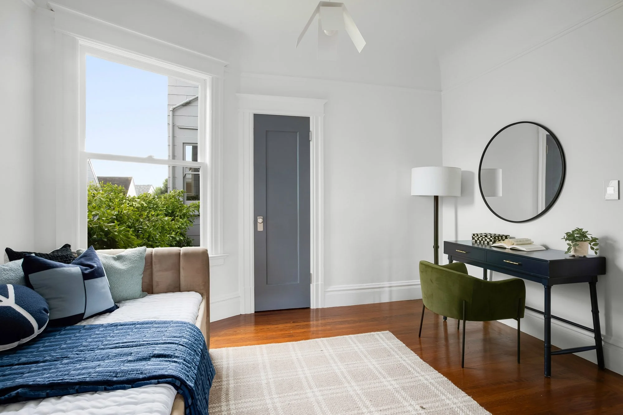 Bright third bedroom with original hardwood floors, Victorian crown molding, large south-facing window with garden outlooks, and flexible layout for office or guest use, Presidio Heights, San Francisco