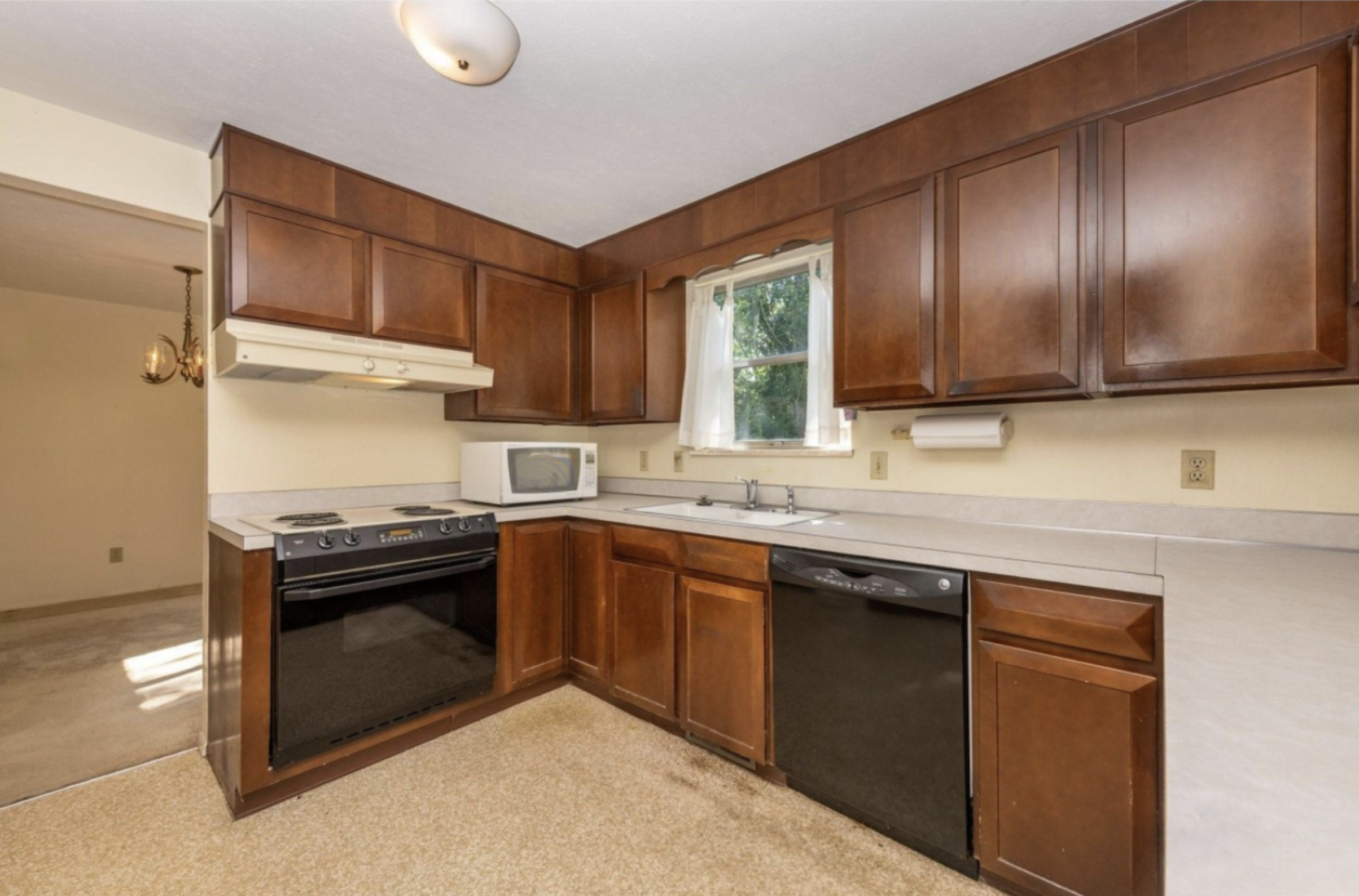 Before: Kitchen with view to Dining Room