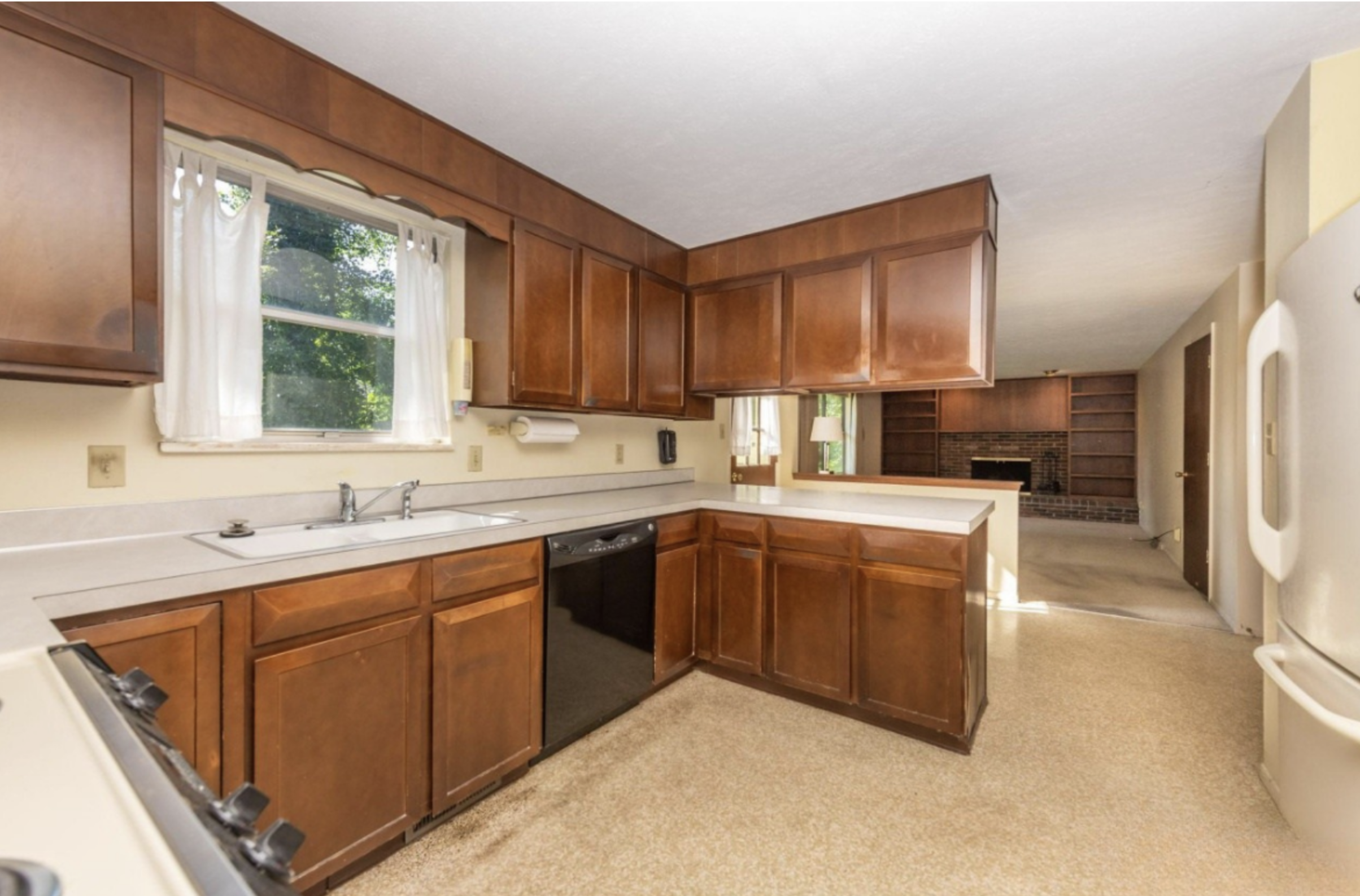 Before: Kitchen with view to Family Room
