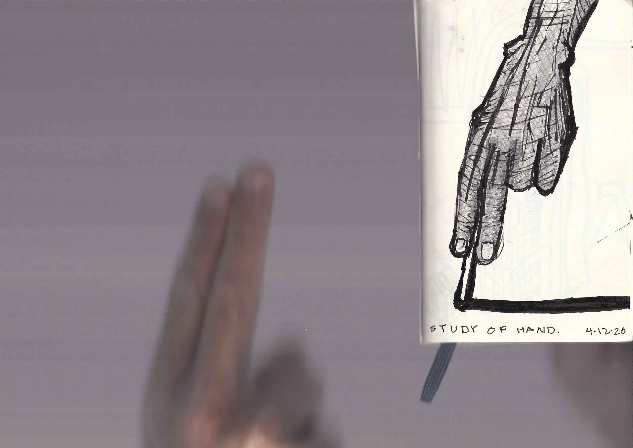 A hand-drawn sketch of a hand with detailed lines and shading, labeled as 'STUDY OF HAND' with the date '4.12.20' underneath. The sketch is on a white background, with a partially visible blue pencil near the lower right corner.