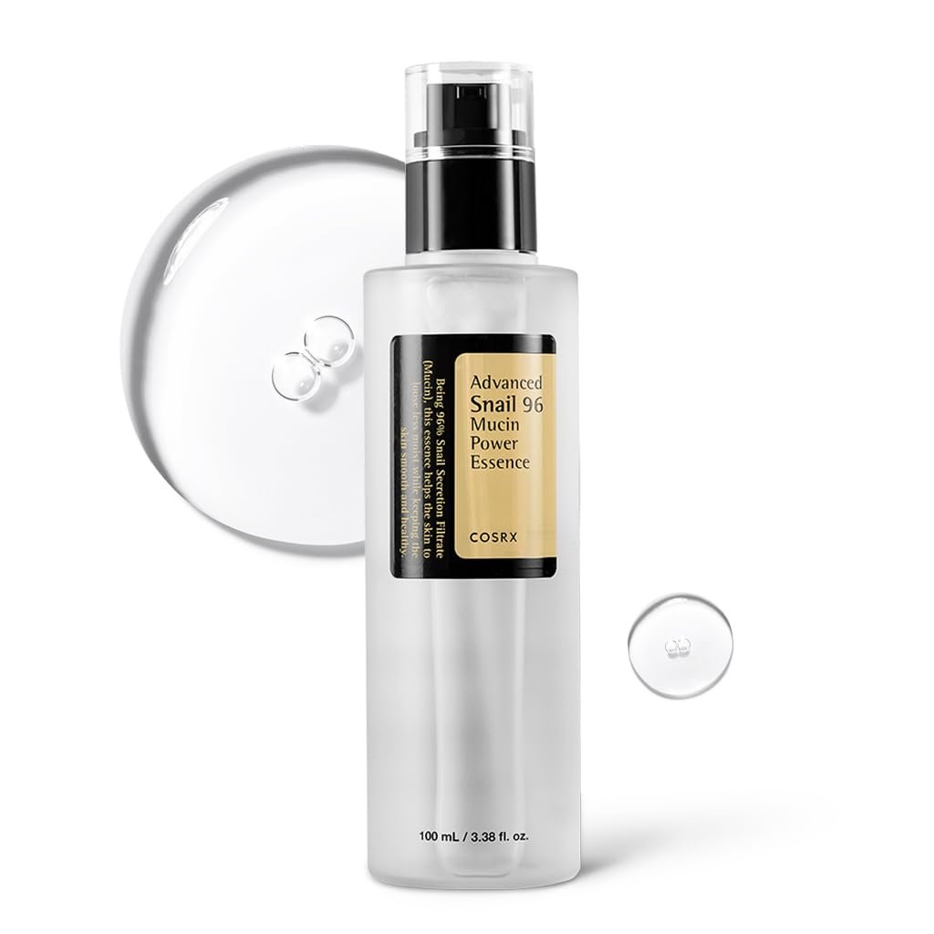 A skincare product labeled 'Advanced Snail 96 Mucin Power Essence' by COSRX, with some liquid or serum drops and a clear background.