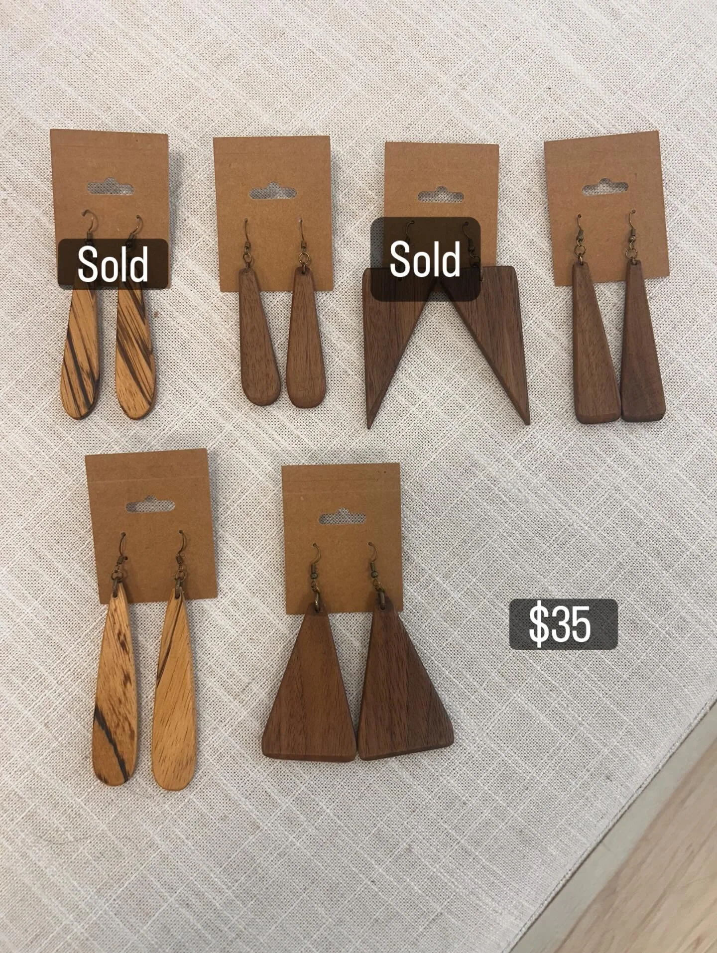 Earrings anyone??
I made a bunch right after Christmas and this is what&rsquo;s left. I&rsquo;ll be making another batch soon 💕
They are hand carved out of Zebra Wood and Black Walnut scraps, from Marks wood shop. 
Please forgive the poor quality ph