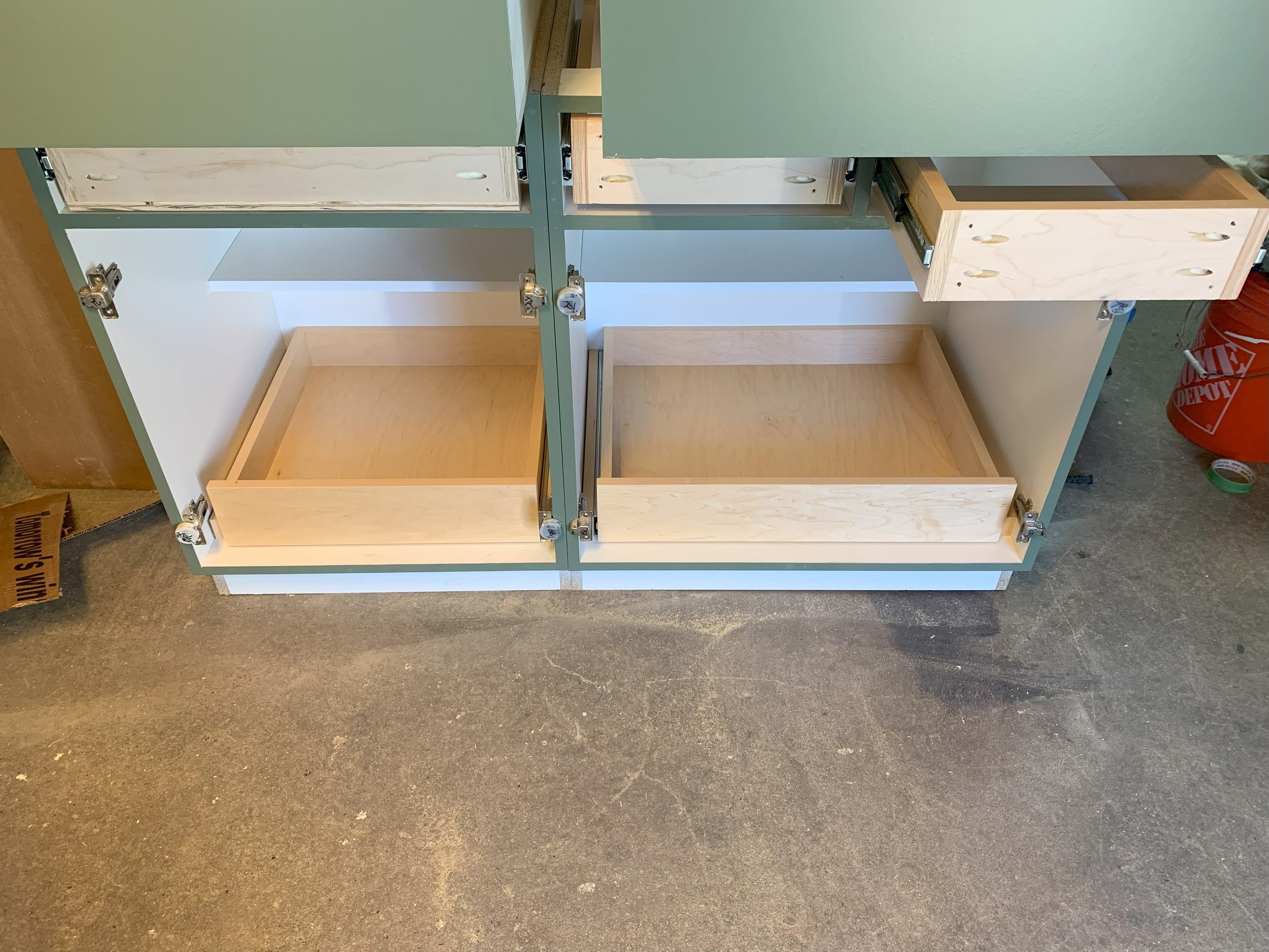 Custom pull out drawers top and bottom, along with set back shelf