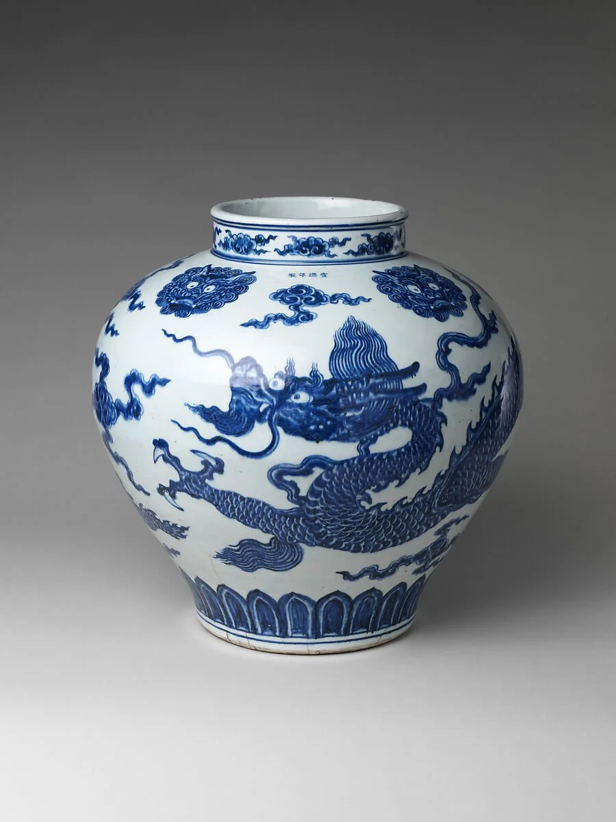 A white porcelain vase with blue dragon and cloud patterns, traditional Chinese design. Richelle Kokol, ISA CAPP, is an ISA Certified Appraiser of Asian Works of Art.