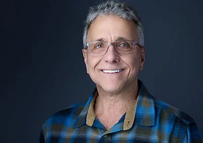 Corporate headshot of Mark Koester, CEO, photographed in Liverpool NY