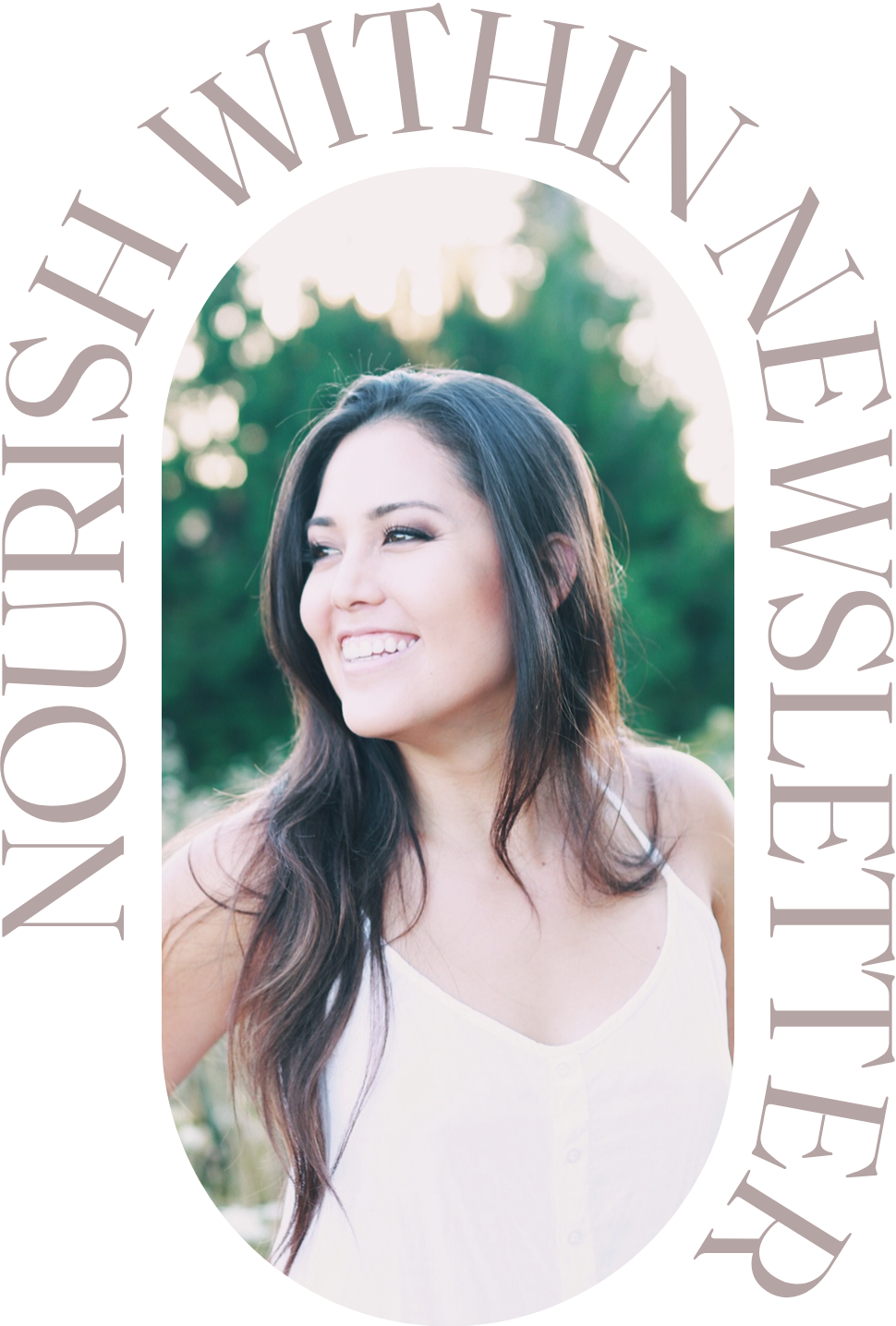 A woman with long dark hair smiling outdoors with blurred green trees and sunlight in the background.