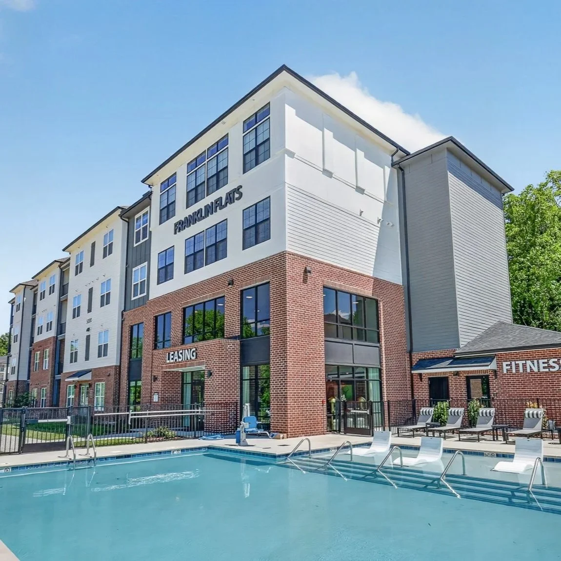 Exterior view of Franklin Flats in Franklin TN, showing the building facade and surroundings.