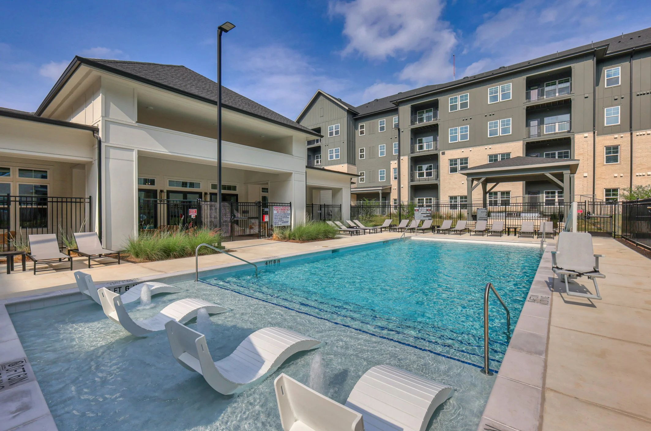 Exterior view of Daffan Flats in Austin TX, showing the building facade and surroundings.