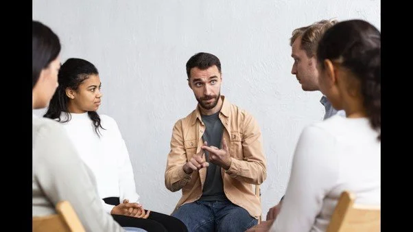 Pastor sharing concerns in peer support group