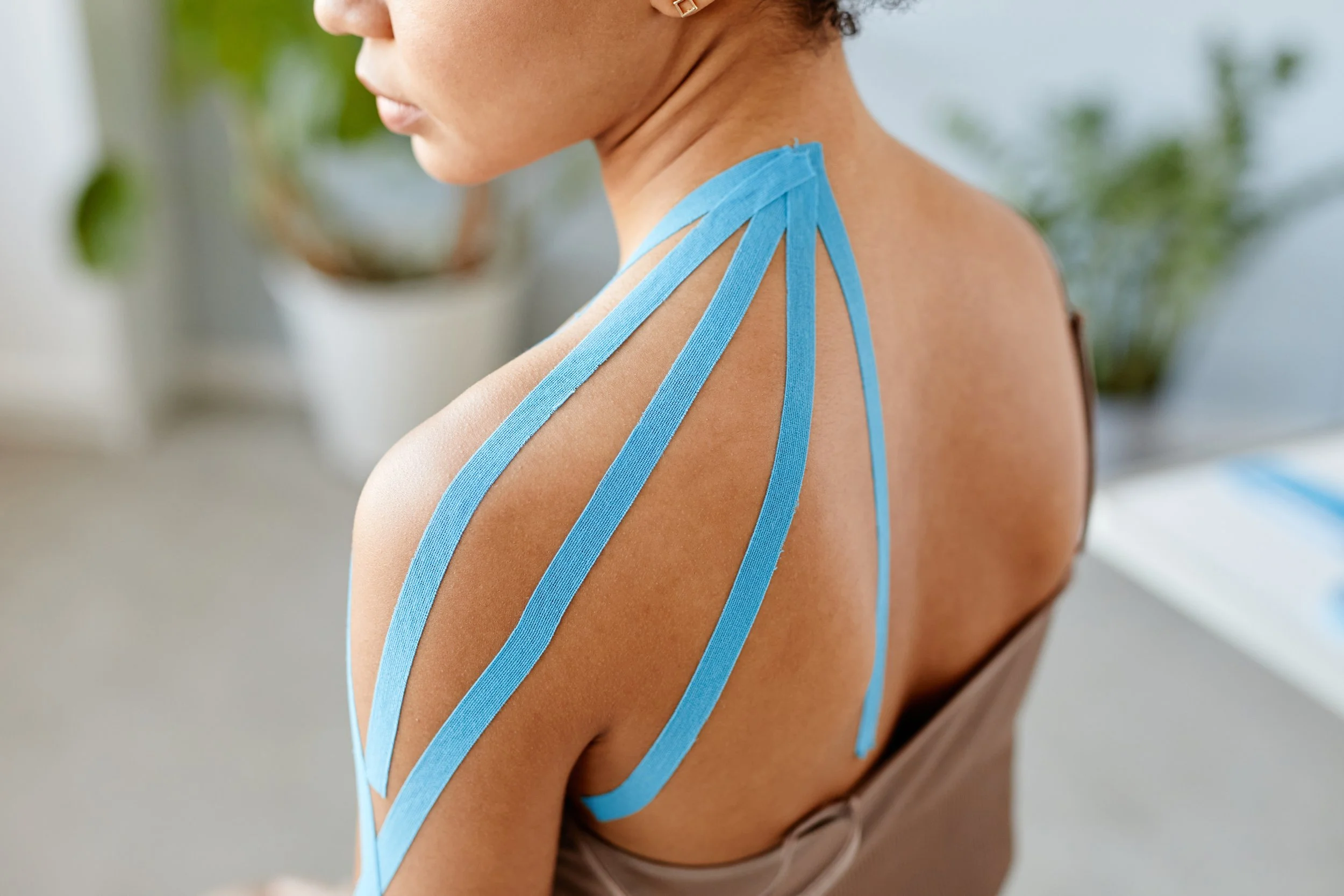 The Benefits of Kinesio Taping: How It Supports Healing and Pain Relief