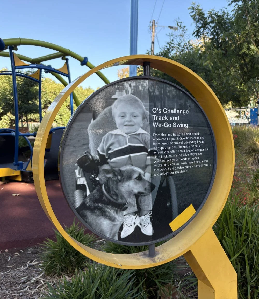 Sign noting Quentin's love of racing his wheelchair like a souped-up car