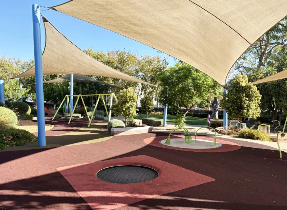 Accessible swings, carousel and trampoline