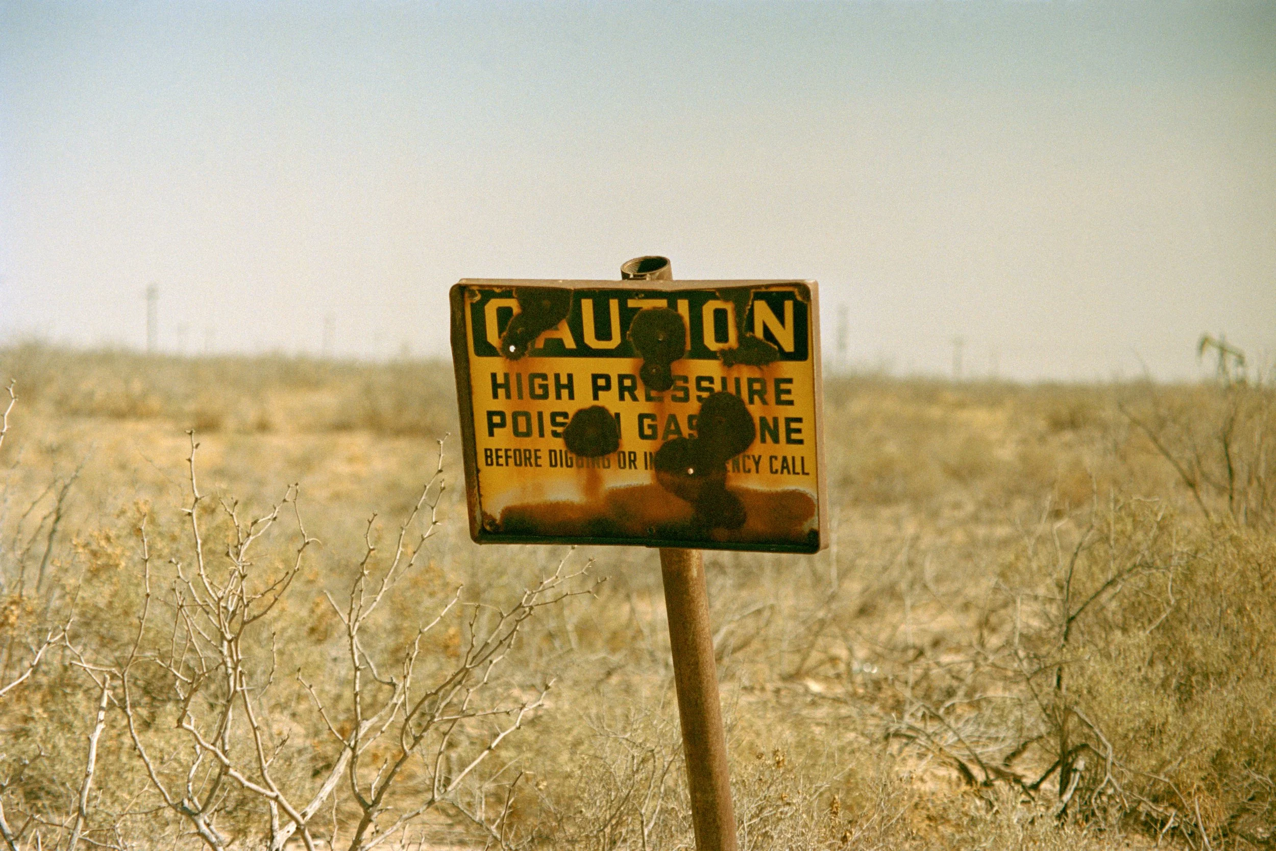 Caution Bullet Holes.jpg