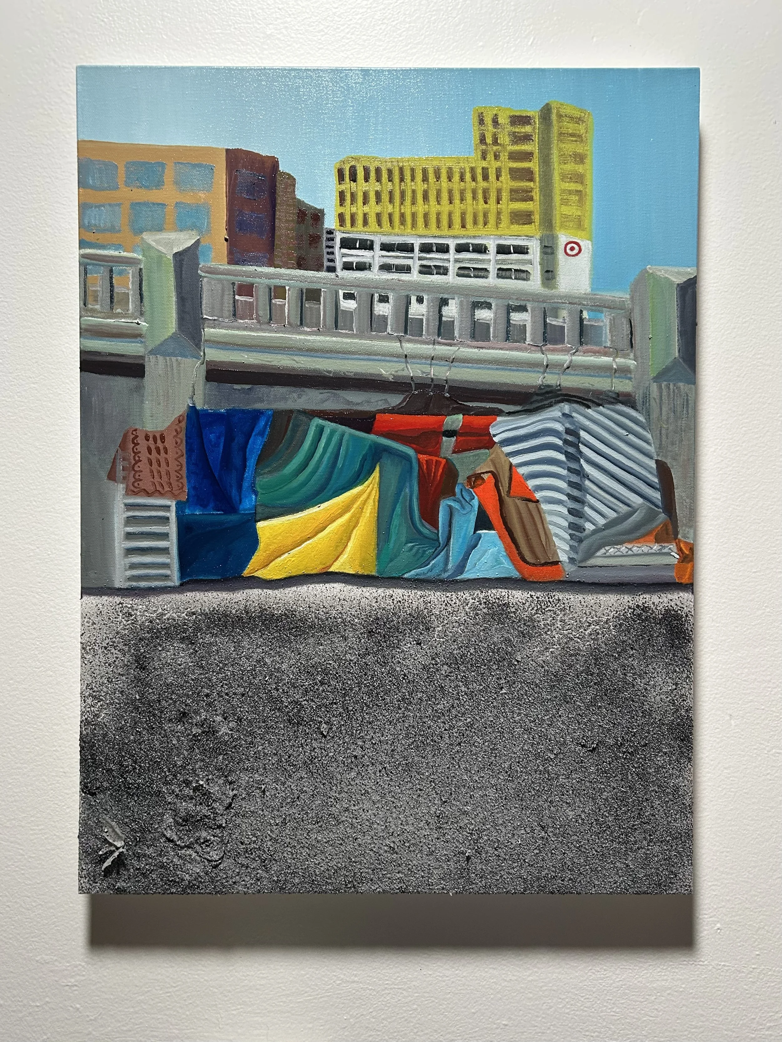 A colorful painting depicting an urban scene with tents made of fabrics at the lower part of the image, a train track above the tents, and tall buildings in the background against a blue sky.