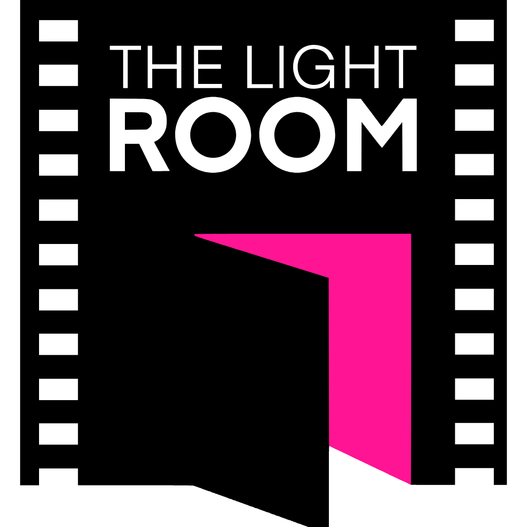 Black background with white text that reads 'The Light Room' and a large pink shape resembling an open door.