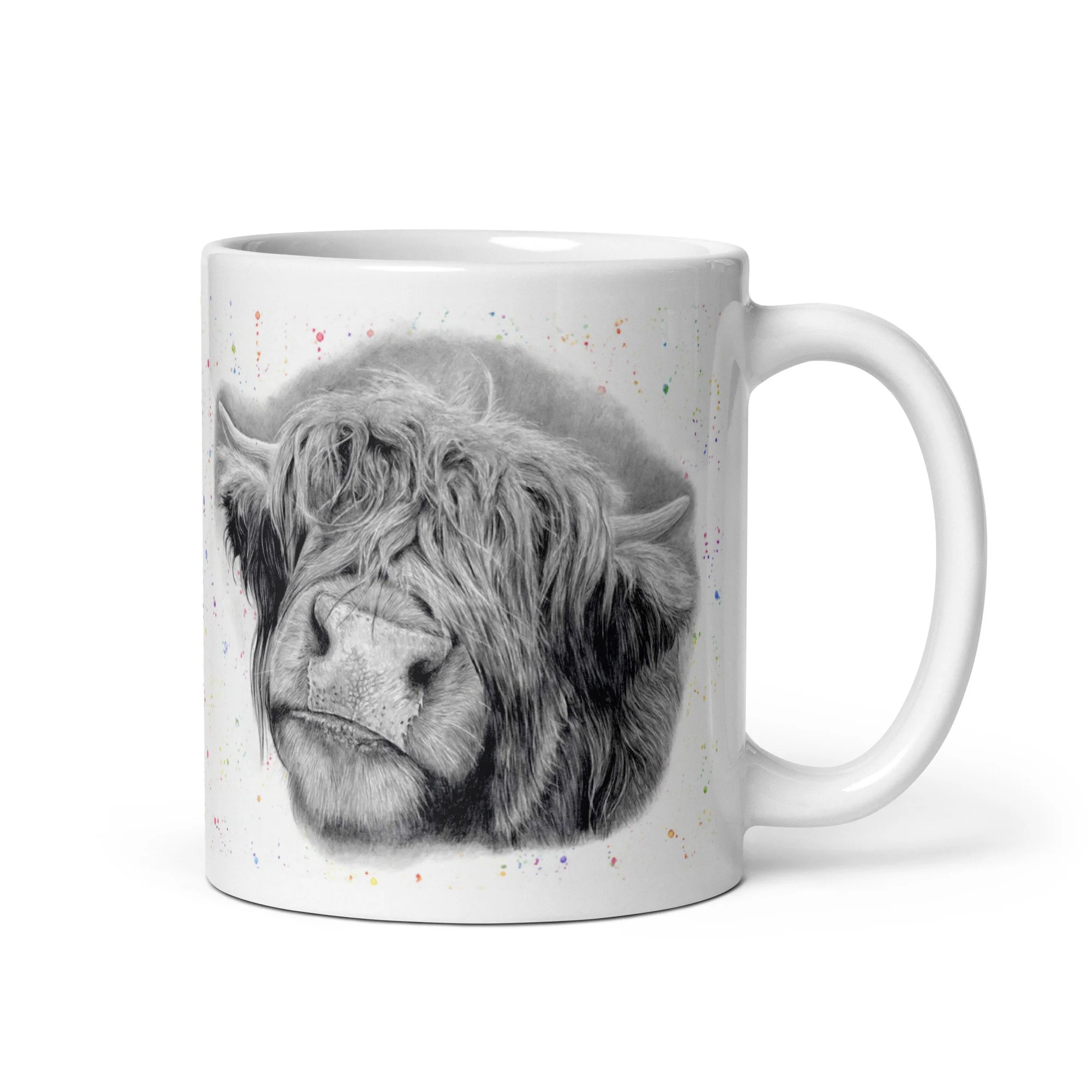 Highland Cow ceramic mug featuring original artwork by Matt Lloyd with a colour fleck background, shown from the front on a glossy white 11oz mug.