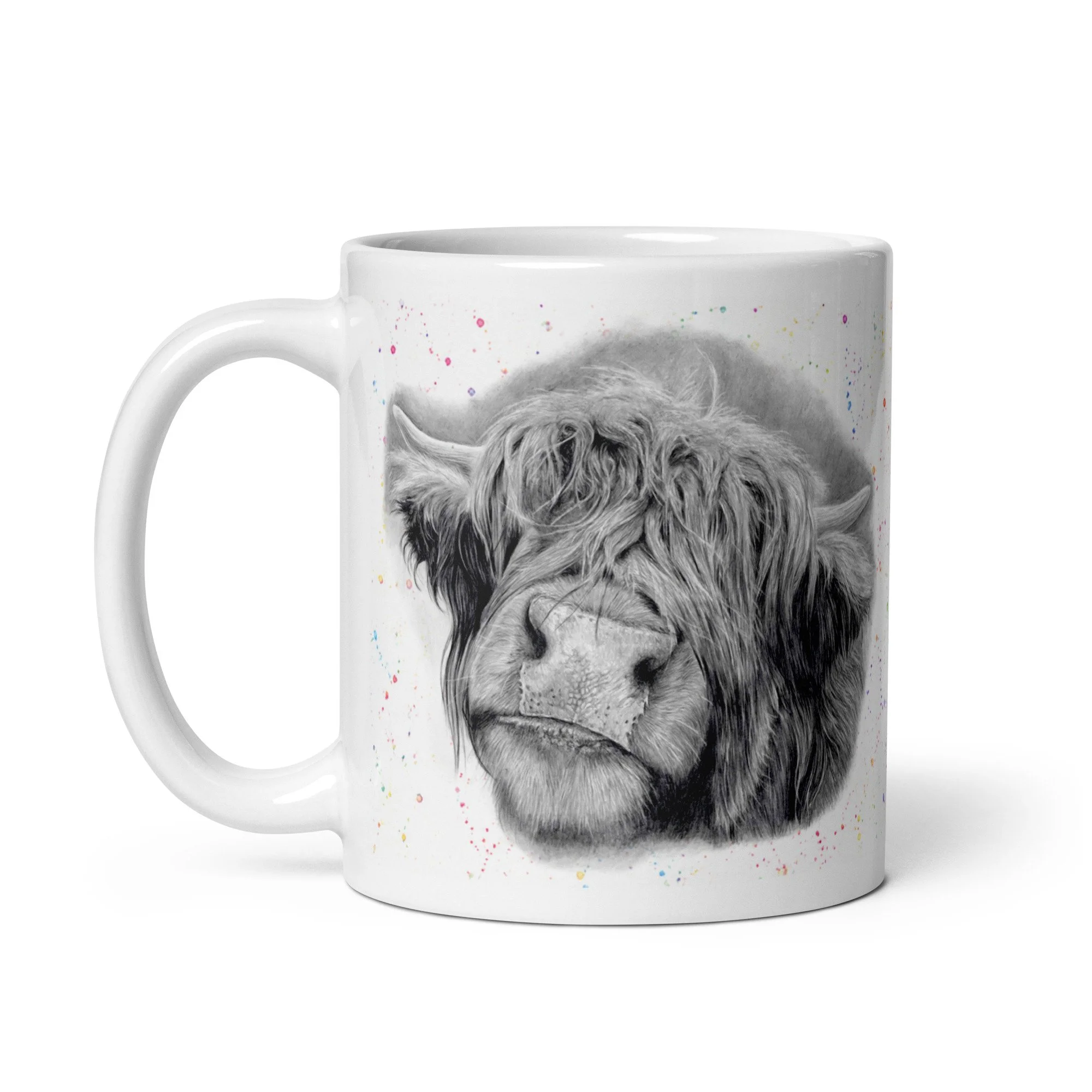 Side view of a Highland Cow ceramic mug showcasing original Highland Cow artwork with a grey fleck design by UK artist Matt Lloyd on a durable glossy white mug.