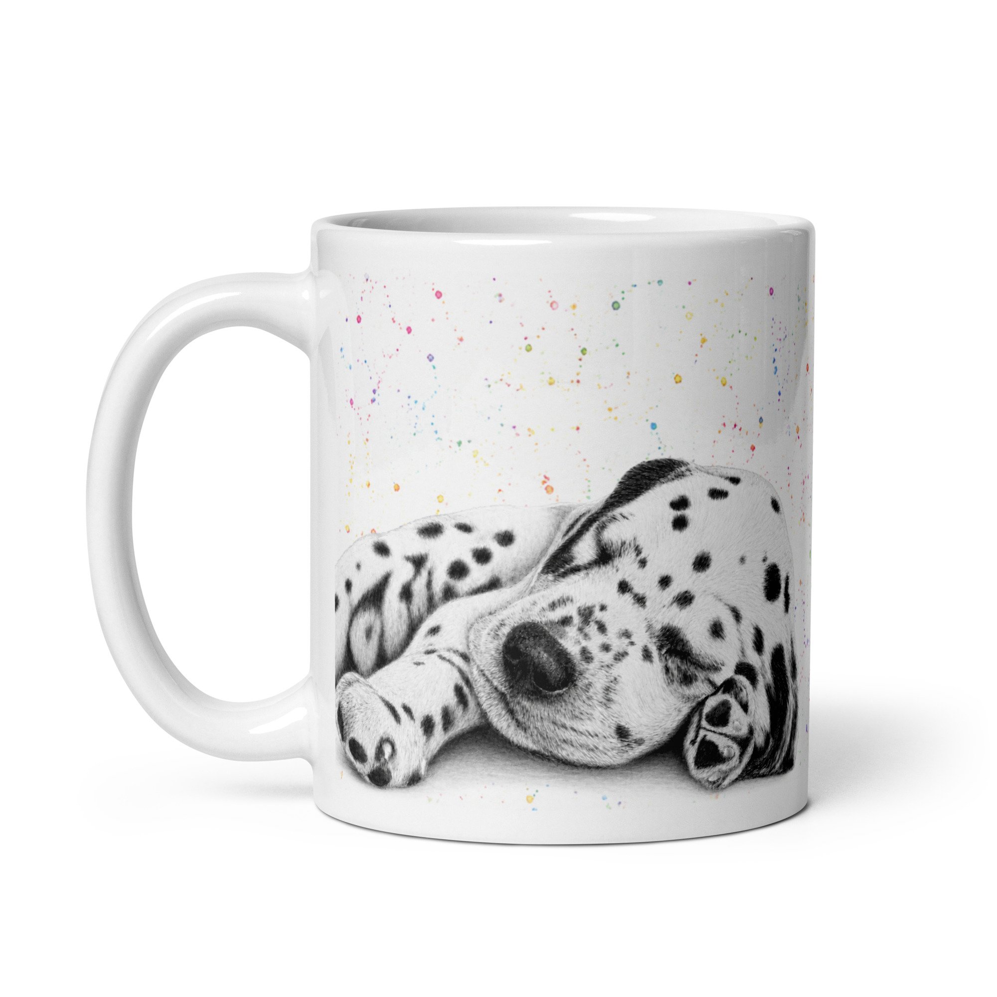 Side view of a ceramic mug featuring a sleeping Dalmatian puppy illustration by Matt Lloyd with a colourful fleck background.