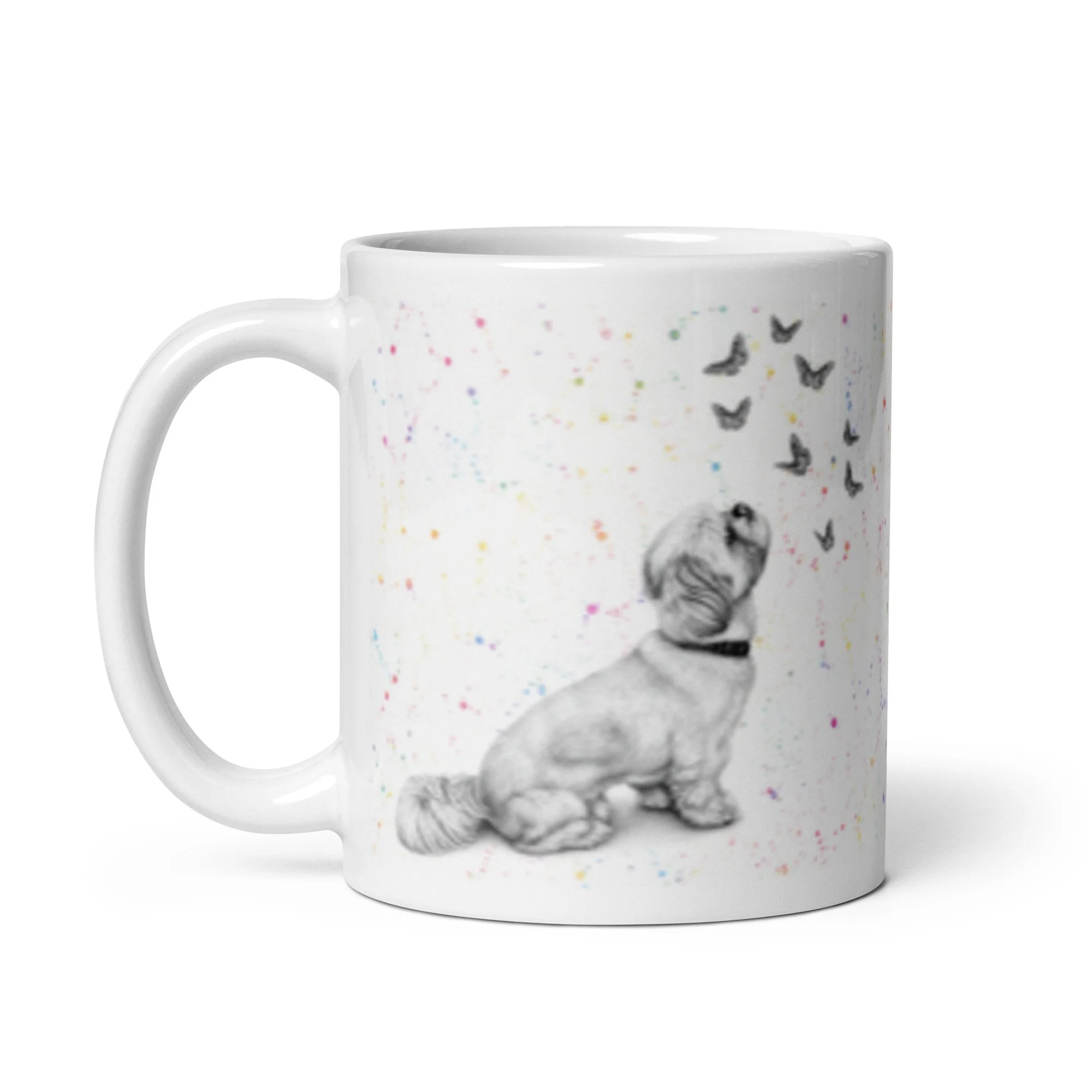 Premium 11oz mug showcasing a Shih Tzu portrait surrounded by butterflies and vibrant colour flecks.