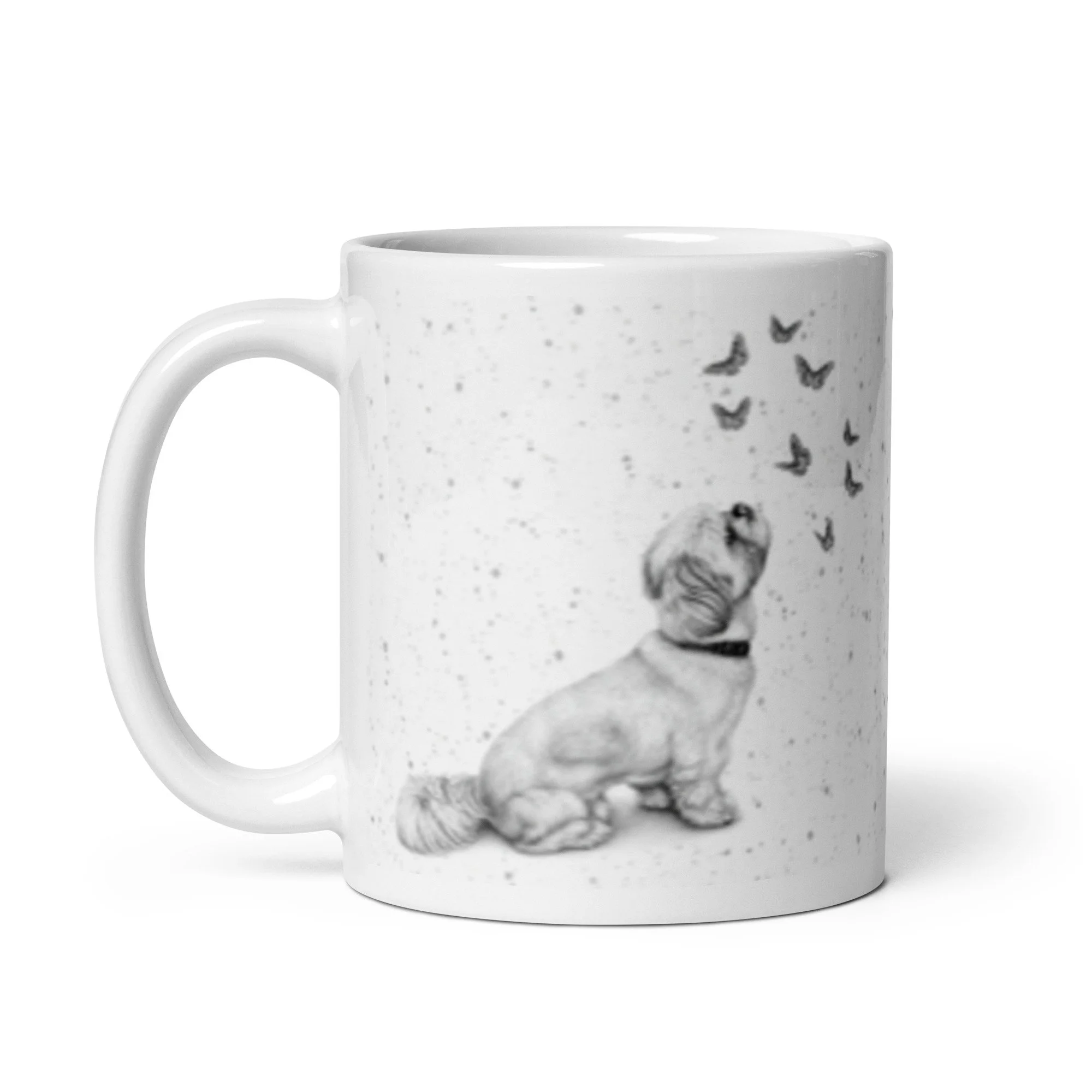 Glossy 11oz Shih Tzu Butterfly coffee mug with a modern grey speckled design and original artwork.