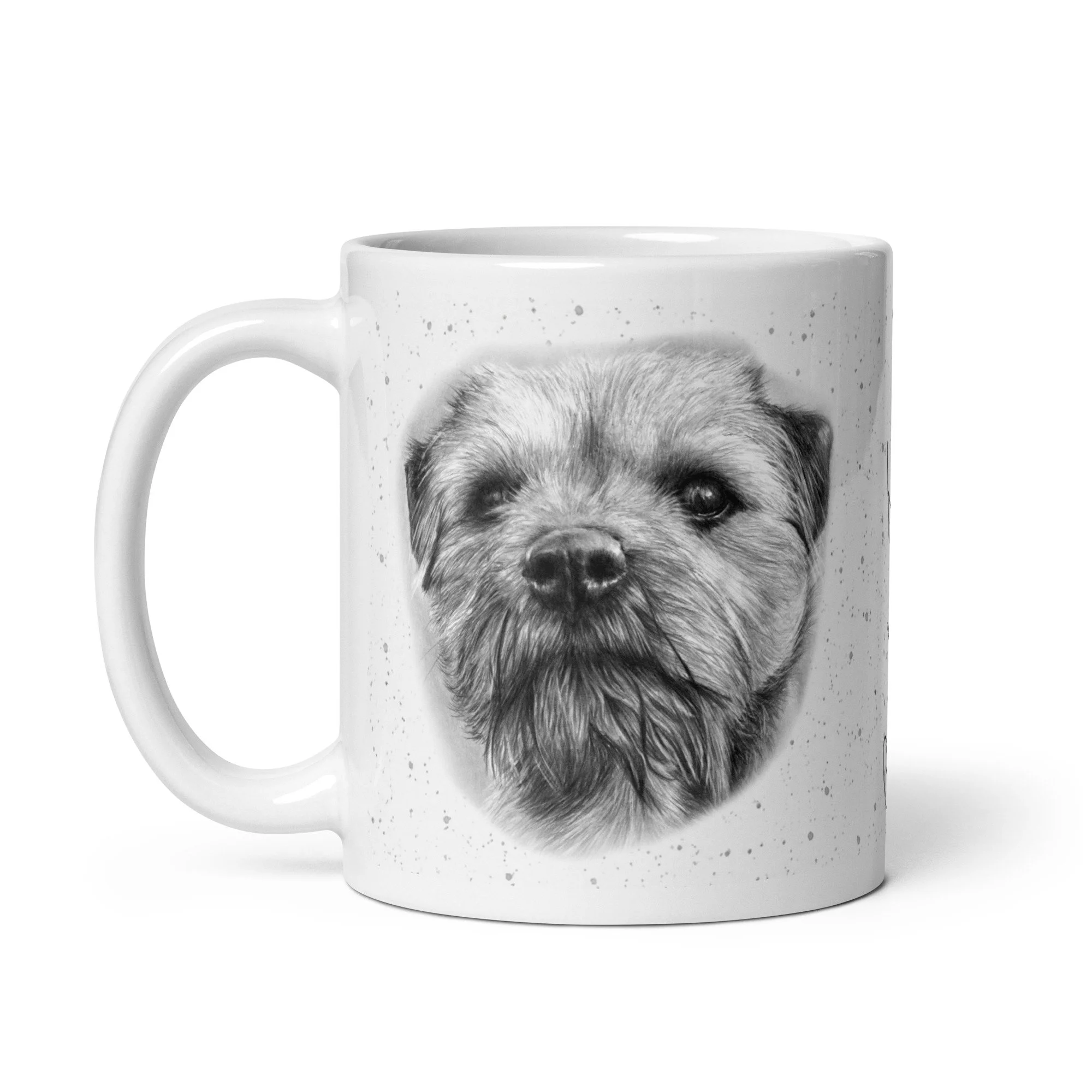 Ceramic mug displaying a Border Terrier portrait with grey speckled background and signature font.