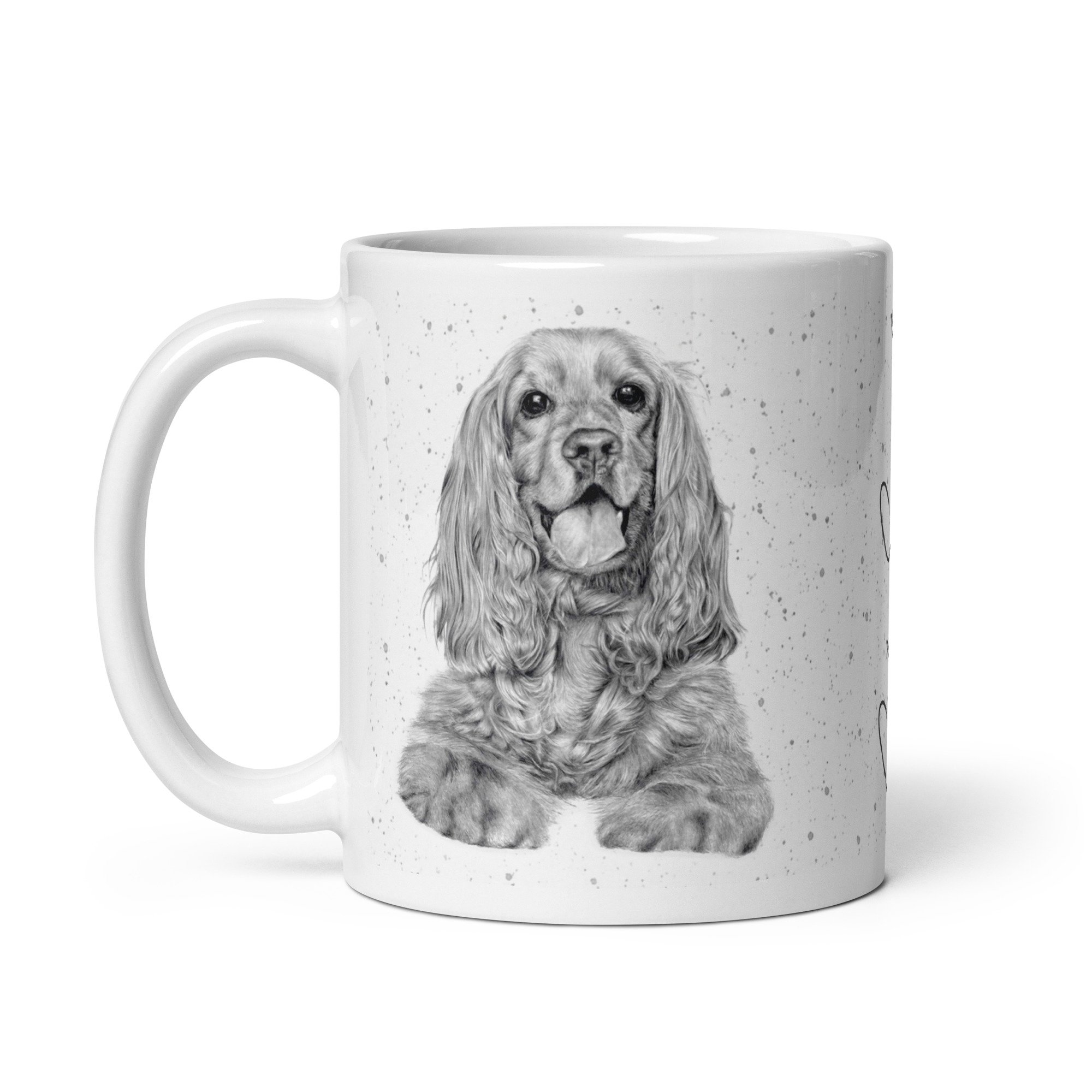 Ceramic mug displaying a Cocker Spaniel portrait with grey speckled background and signature font.