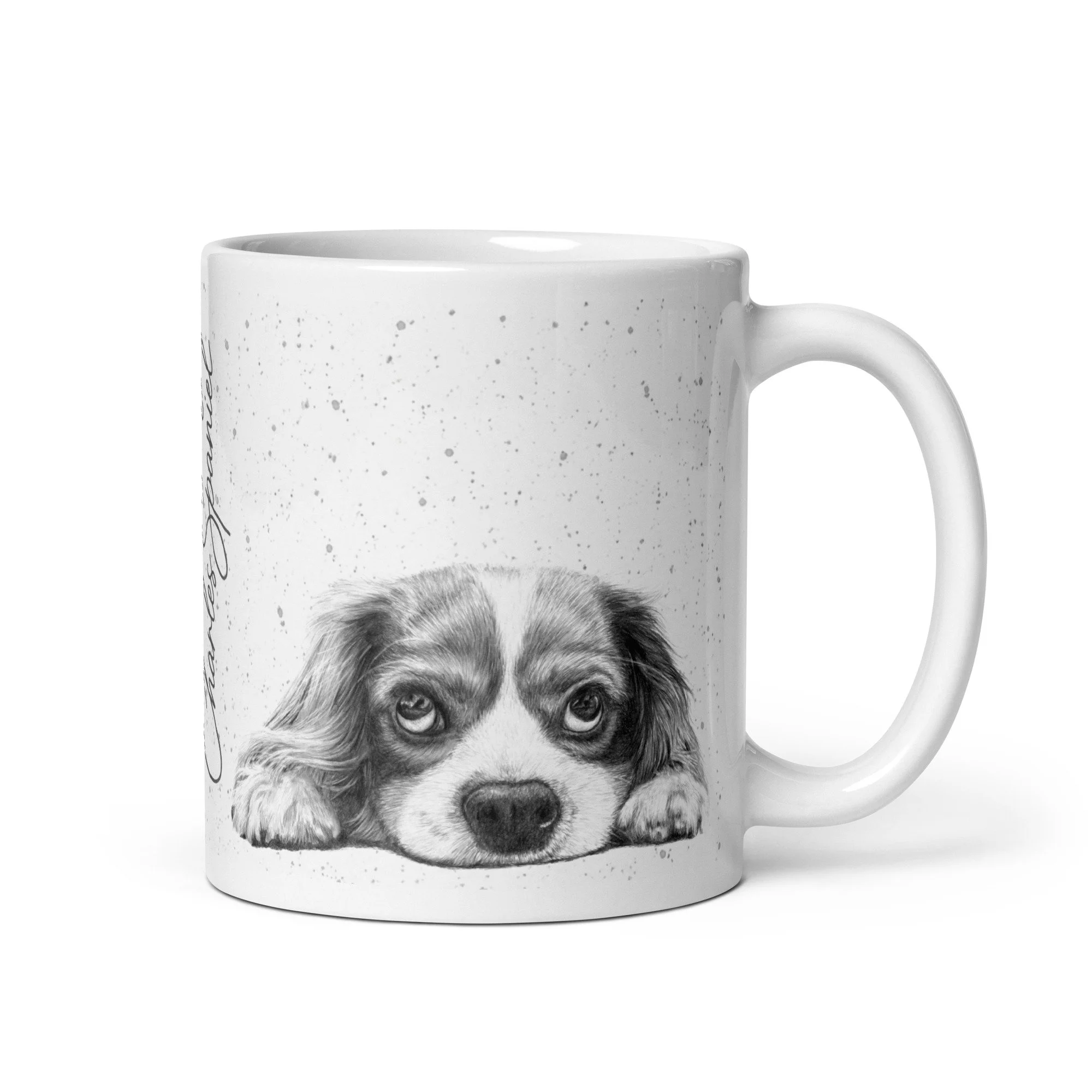 Cavalier King Charles Spaniel ceramic mug featuring original artwork by Matt Lloyd on a grey fleck background.
