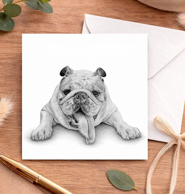 British Bulldog greeting card showing the characterful dog lying down with its tongue out