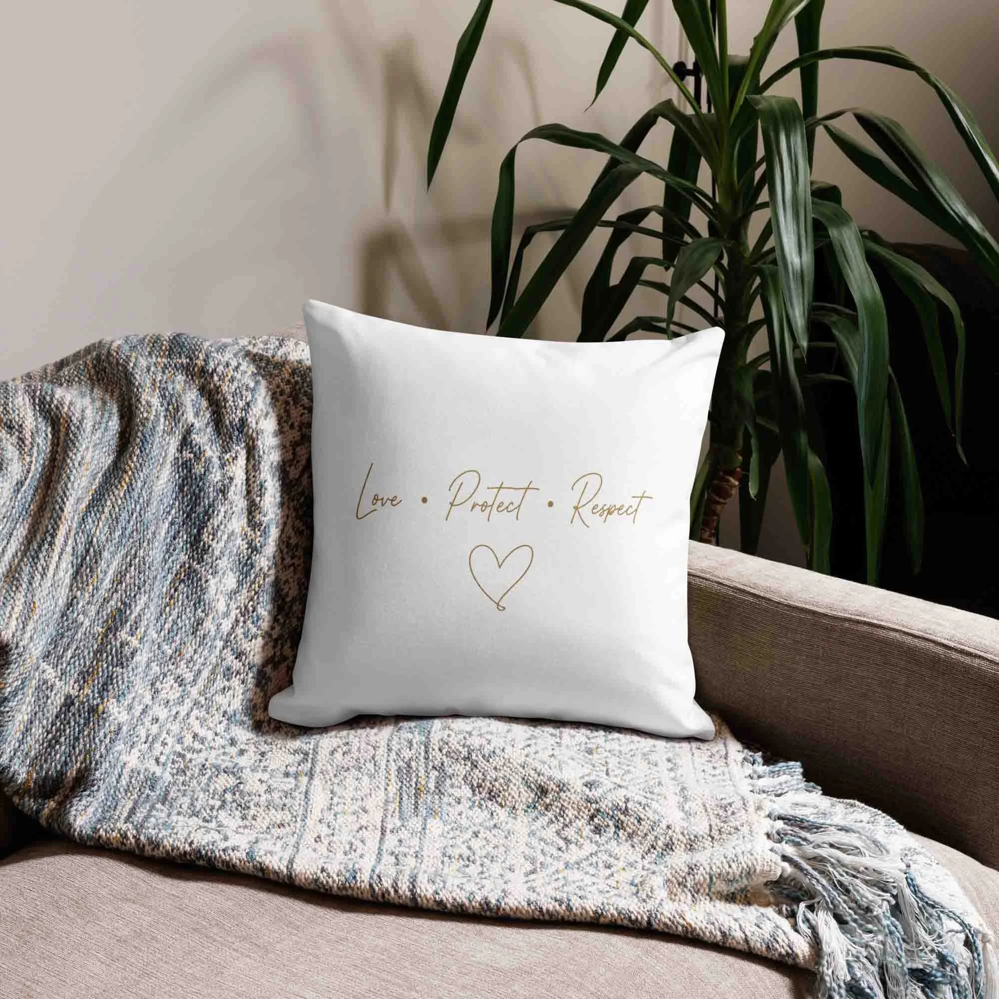 Elephant and calf back of cushion on a sofa.jpg
