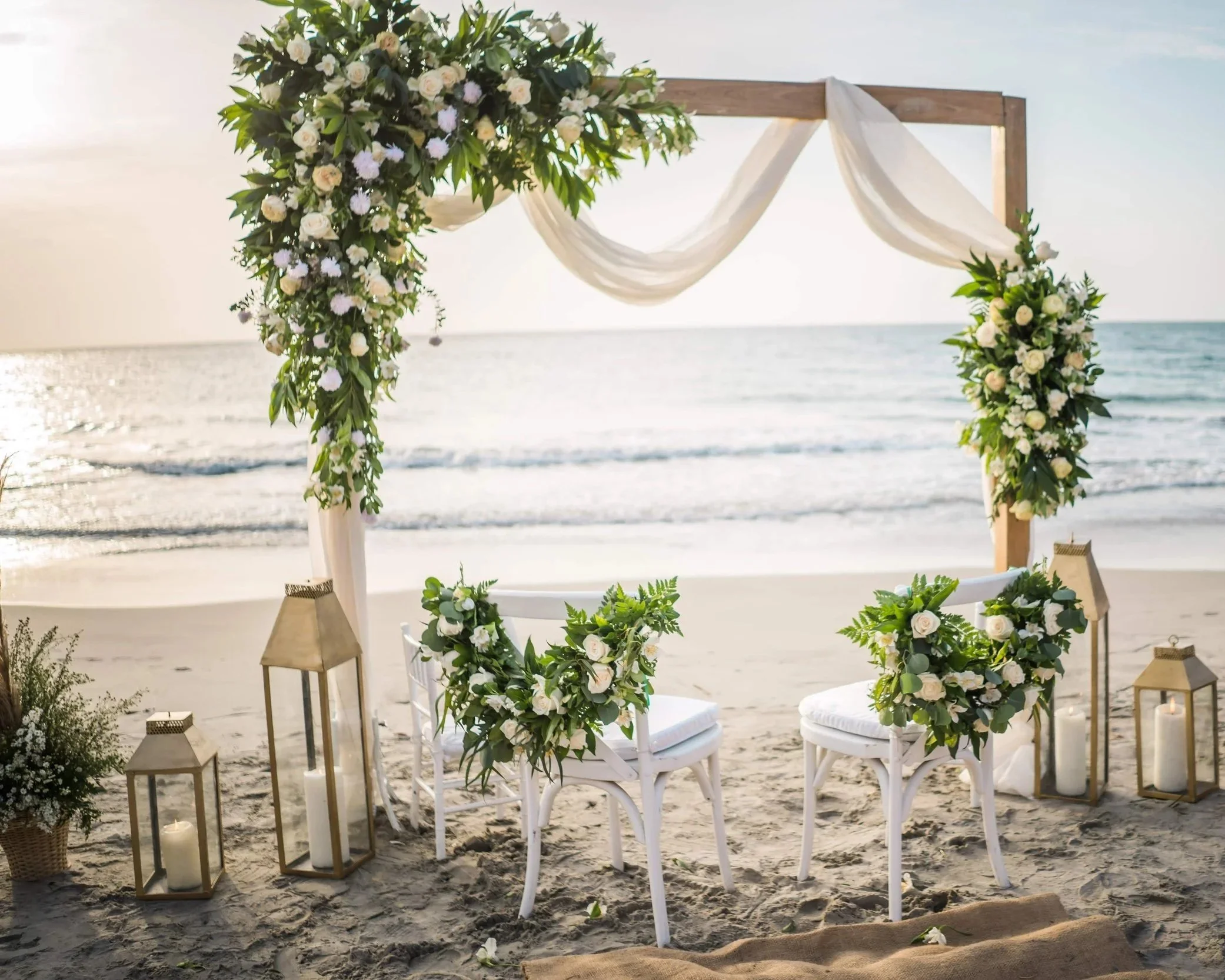 Luxury beach wedding altar setup at Blue Apple Beach for an intentional destination wedding in Cartagena by Bel Altar.