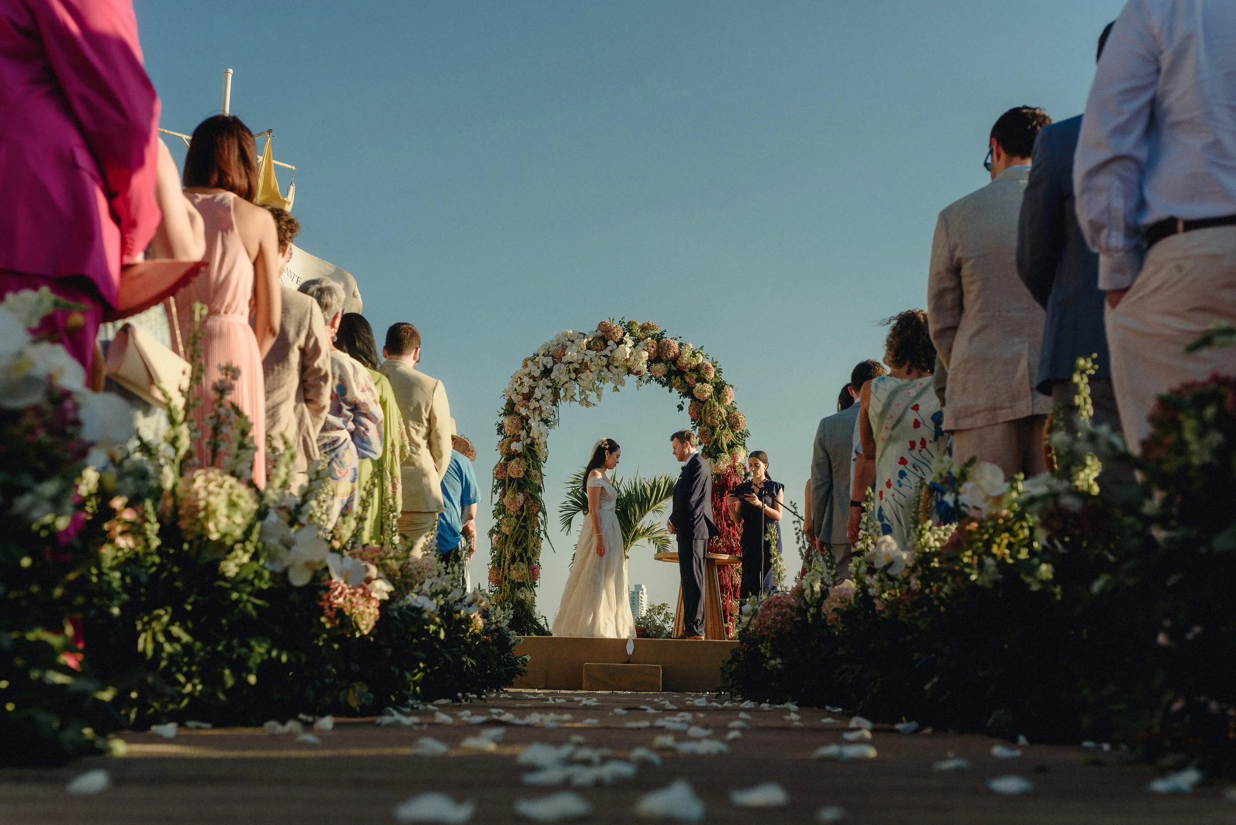Bilingual wedding celebrant leading an elegant destination wedding ceremony in Cartagena with Bel Altar.