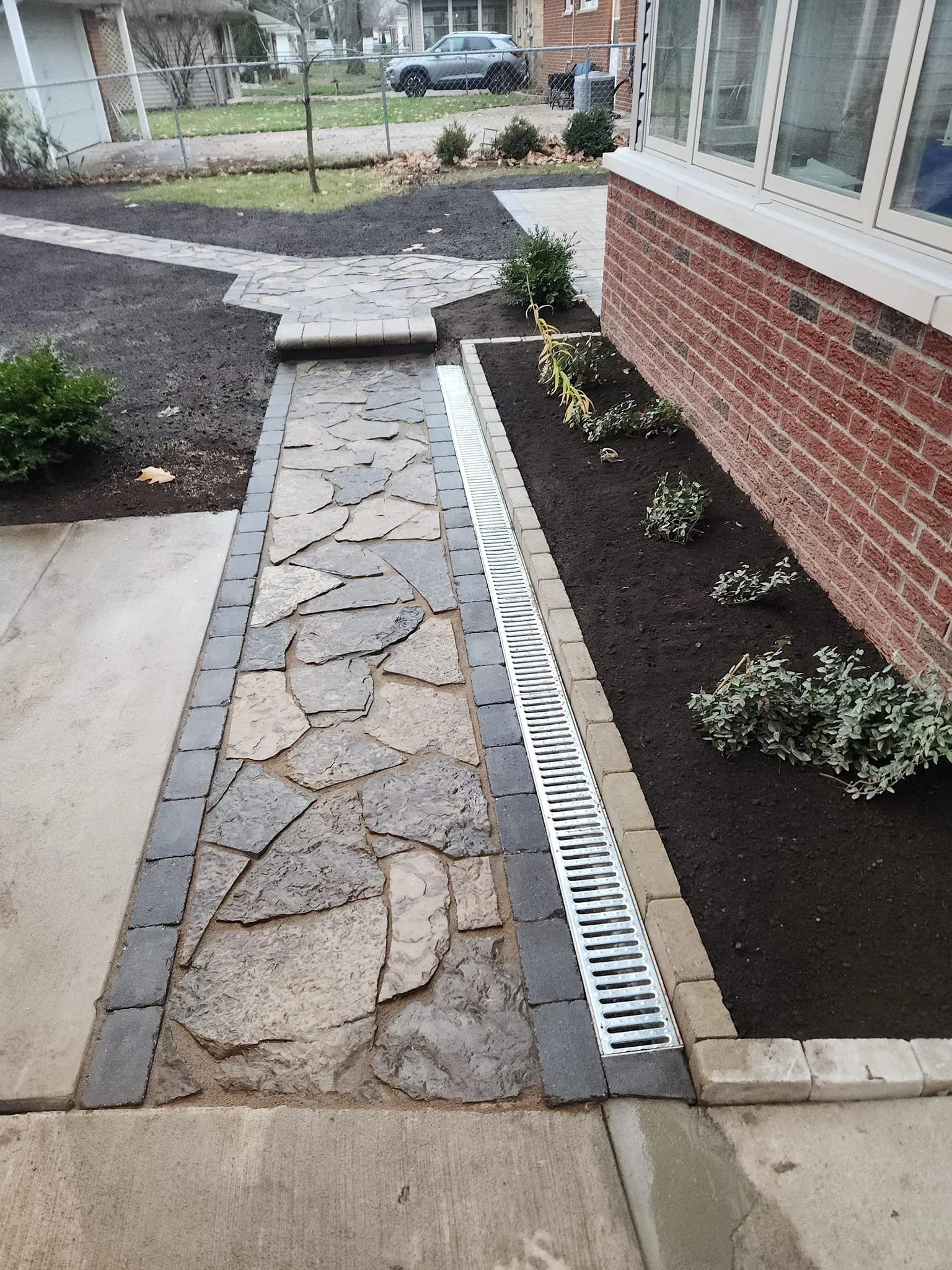 FLAGSTONE WALKWAY AND PATIO INSTALL.jpg