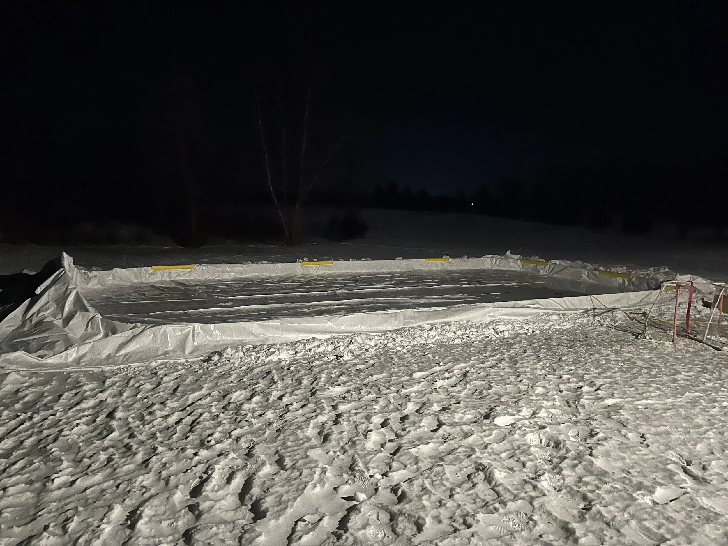 Ice rink liner being filled in one continuous fill