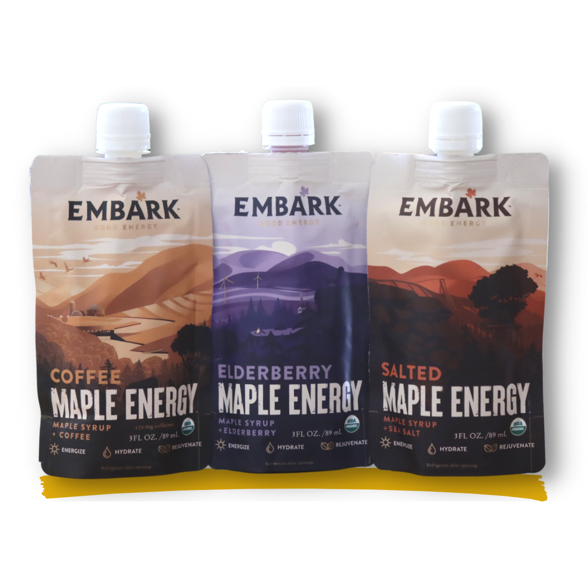 Three pouches of Embark Maple Energy syrup with different flavors: Coffee, Elderberry, and Salted, standing upright on a yellow surface with a black background. The pouches are labeled with the flavor and contain 3 fluid ounces of syrup each.