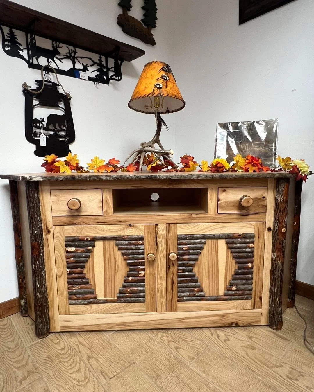 Discover the warmth and character of a corner TV center carefully handcrafted from Hickory logs by skilled Amish artisans.  On sale now at Rustic Retreat Furniture in Lakewood.