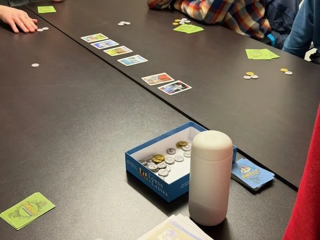 We learned many new types of games at our in-person board game night. Lots of laughter and fun!