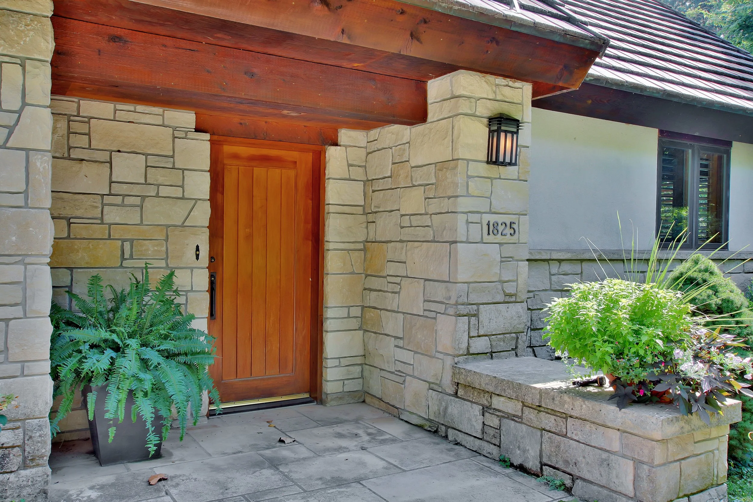 custom-winfield-kansas-home-exterior-cottage-style-caton-entry.jpg