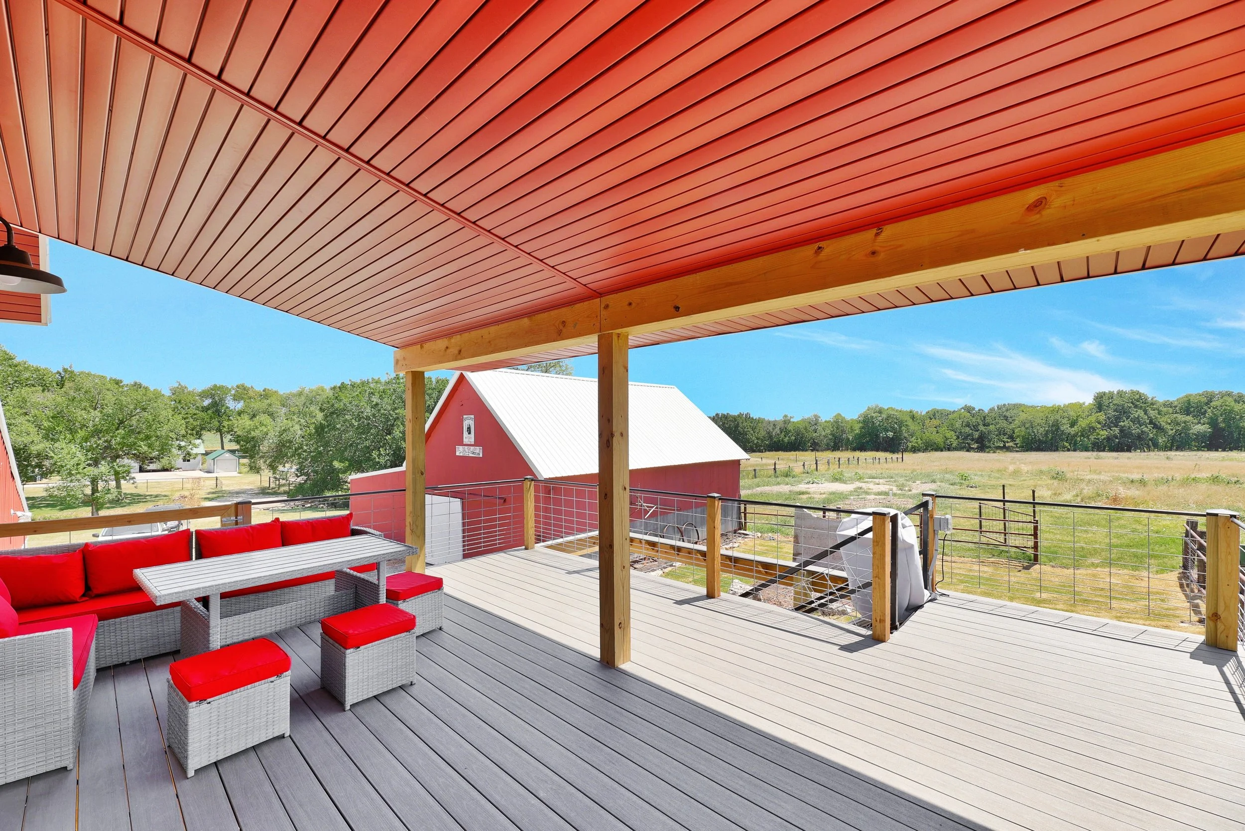 historic-barn-home-renovation-kansas-open-concept-elevated-covered-deck