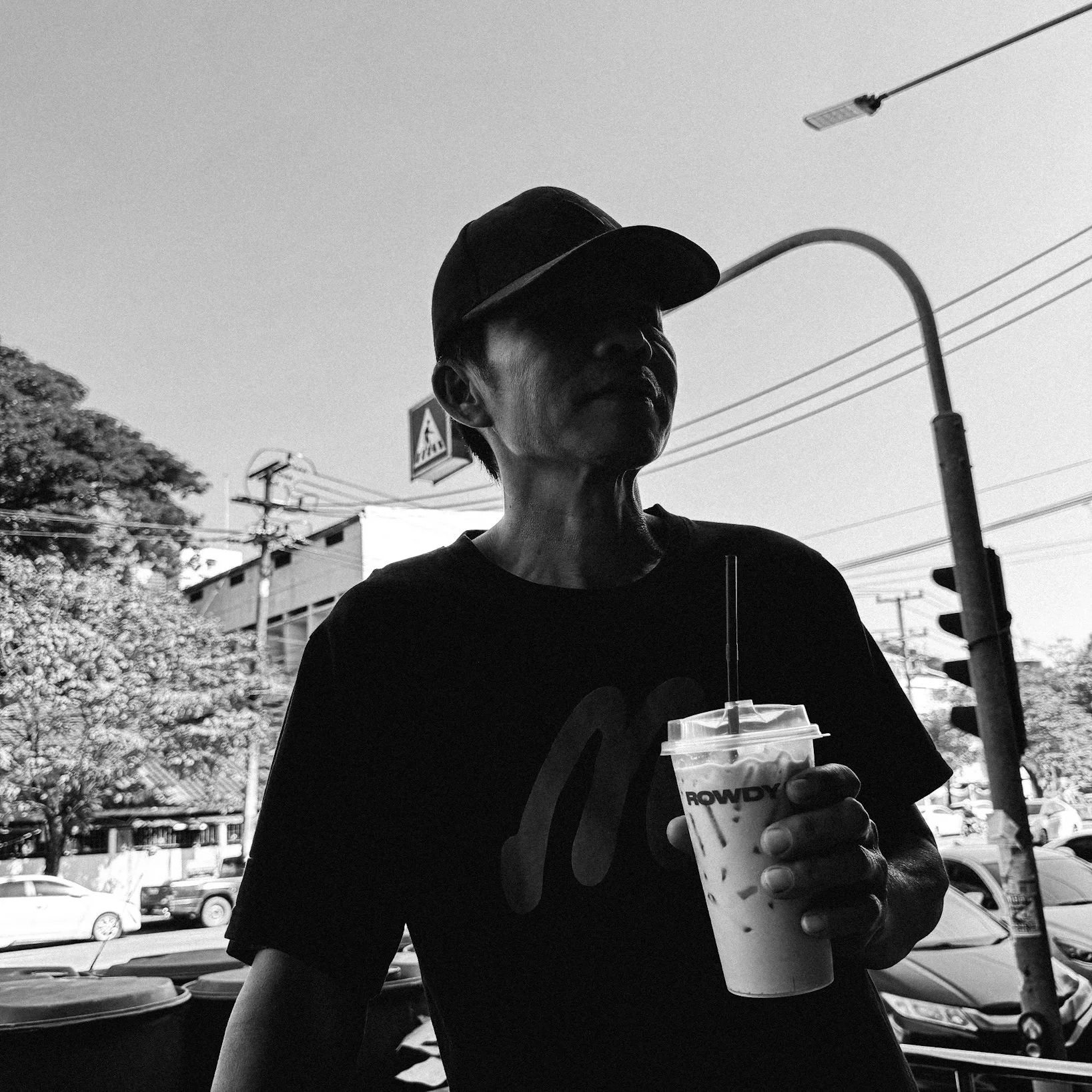Customer enjoying coffee at ROWDY, specialty coffee shop in Chiang Mai