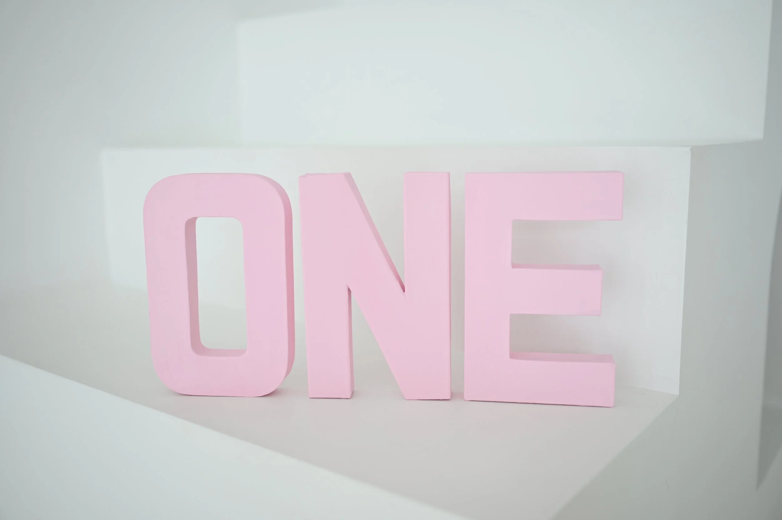 Pink “ONE” Block Letters