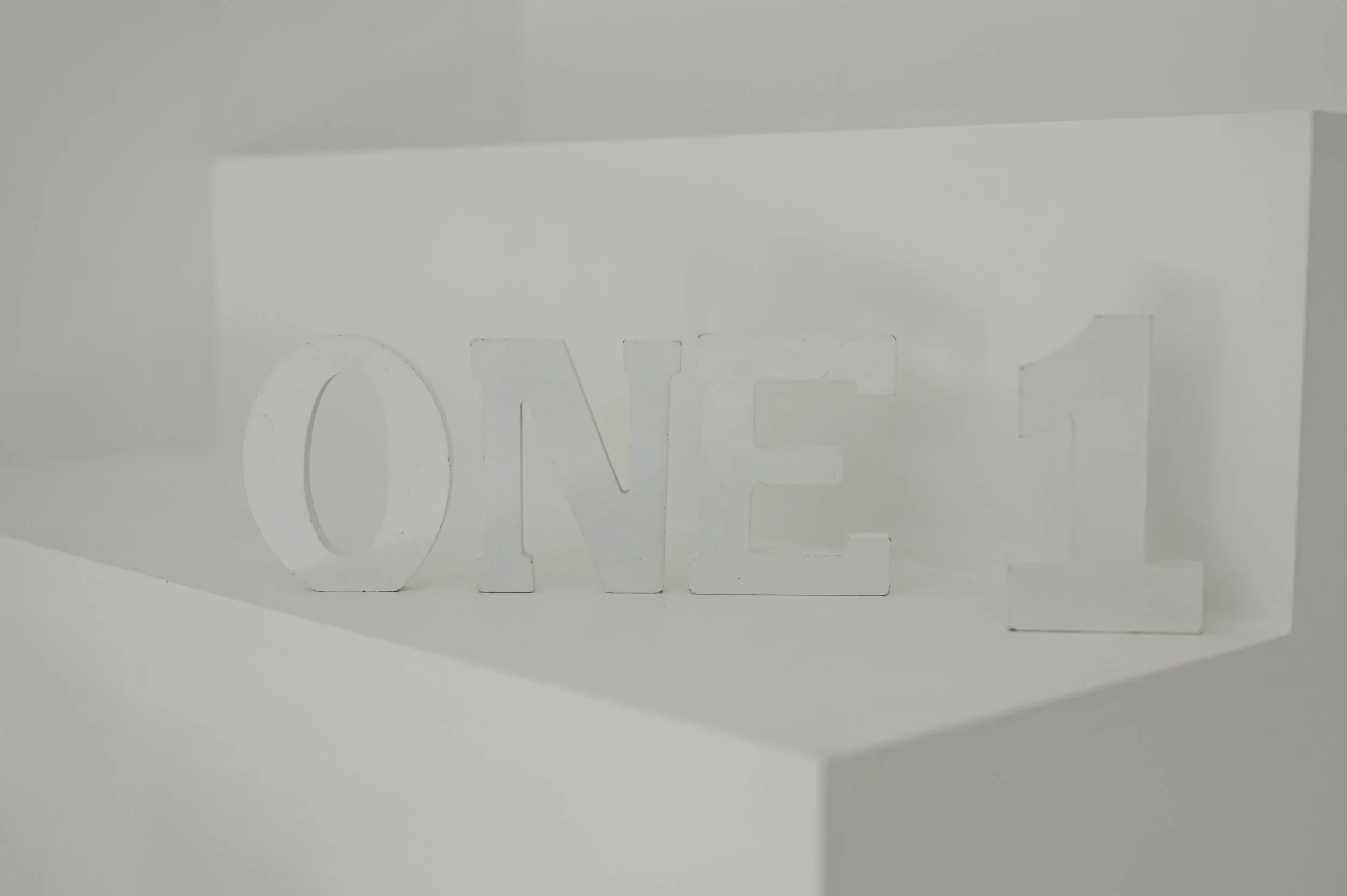 Neutral “ONE” and Number One 