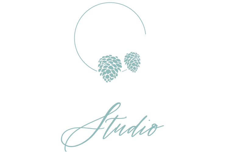 Logo for Cottage Craft Studio featuring a pine branch and pinecones