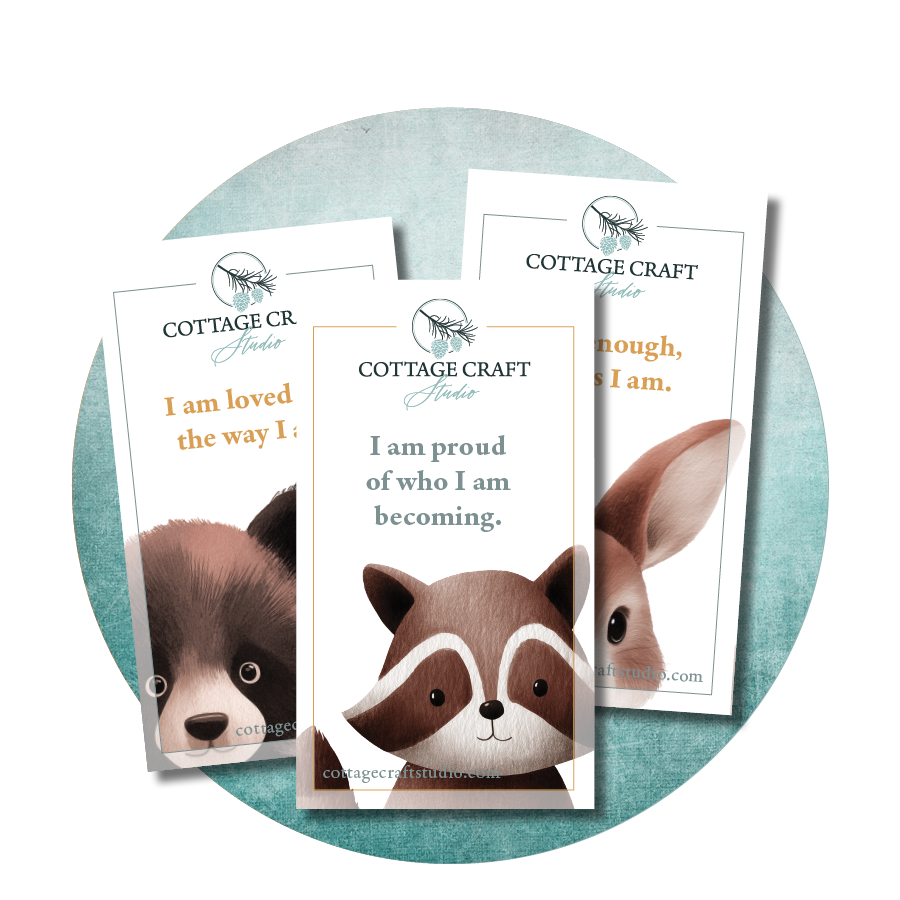Three motivational cards with animal illustrations and positive messages, displayed on a circular surface.