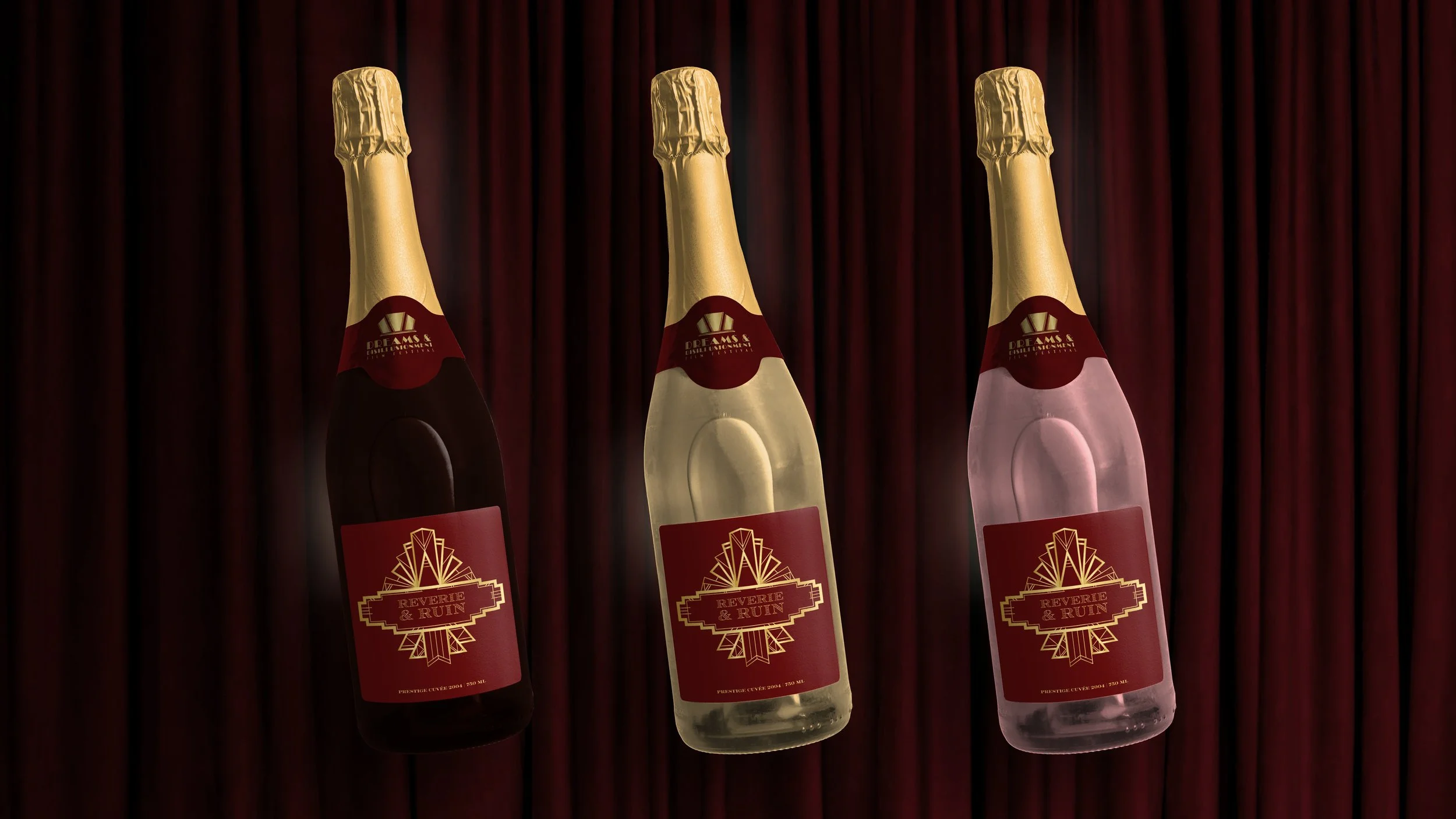 Three bottles of bubbly champagne with gold foil tops, displayed against a red curtain backdrop. The bottles have red labels with gold geometric designs and text.