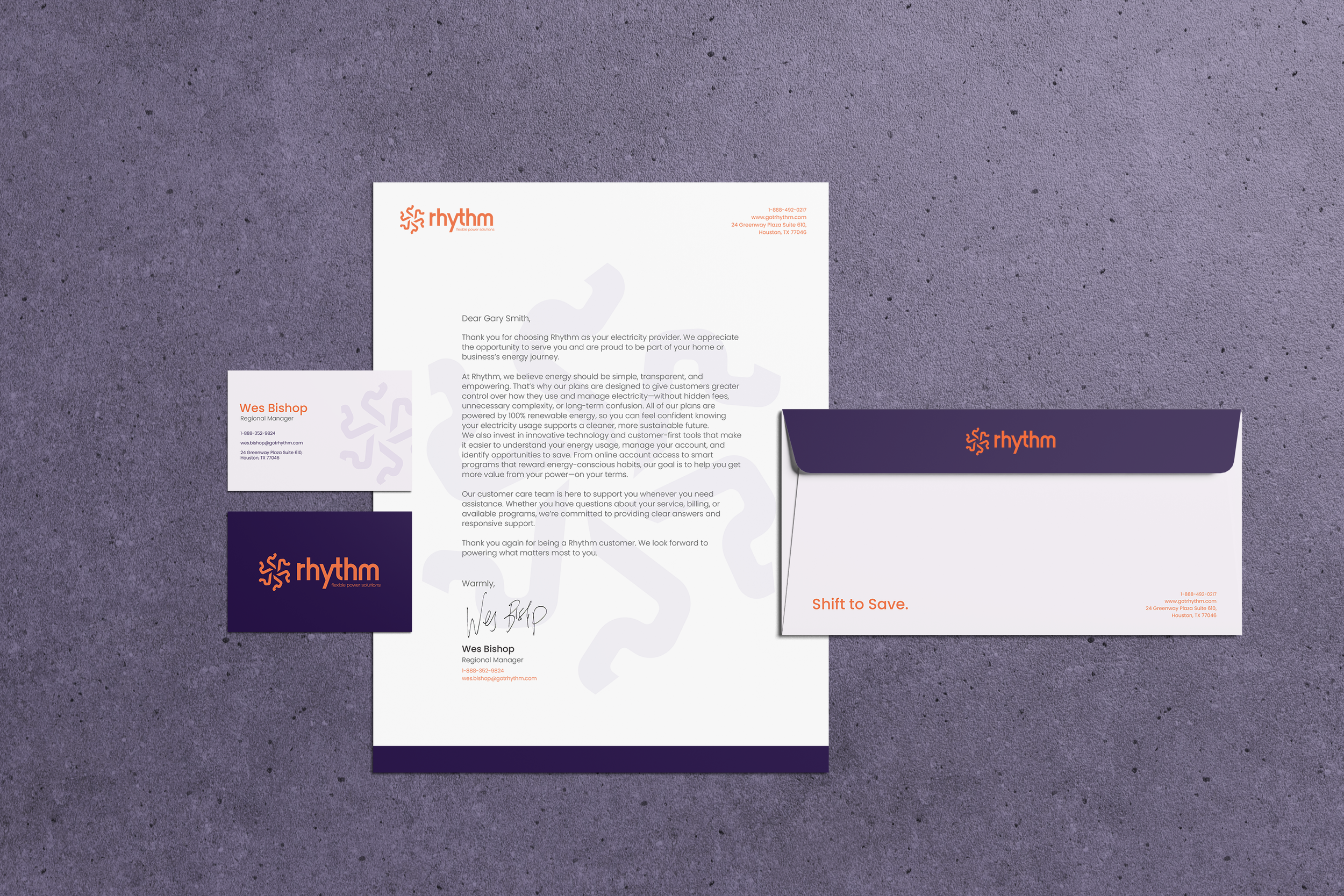 Business stationery set including a letter, two business cards, and an envelope. The branding is for Rhythm, an energy company, with a purple and orange color scheme. The letter is signed by Wes Bishop, Regional Manager.