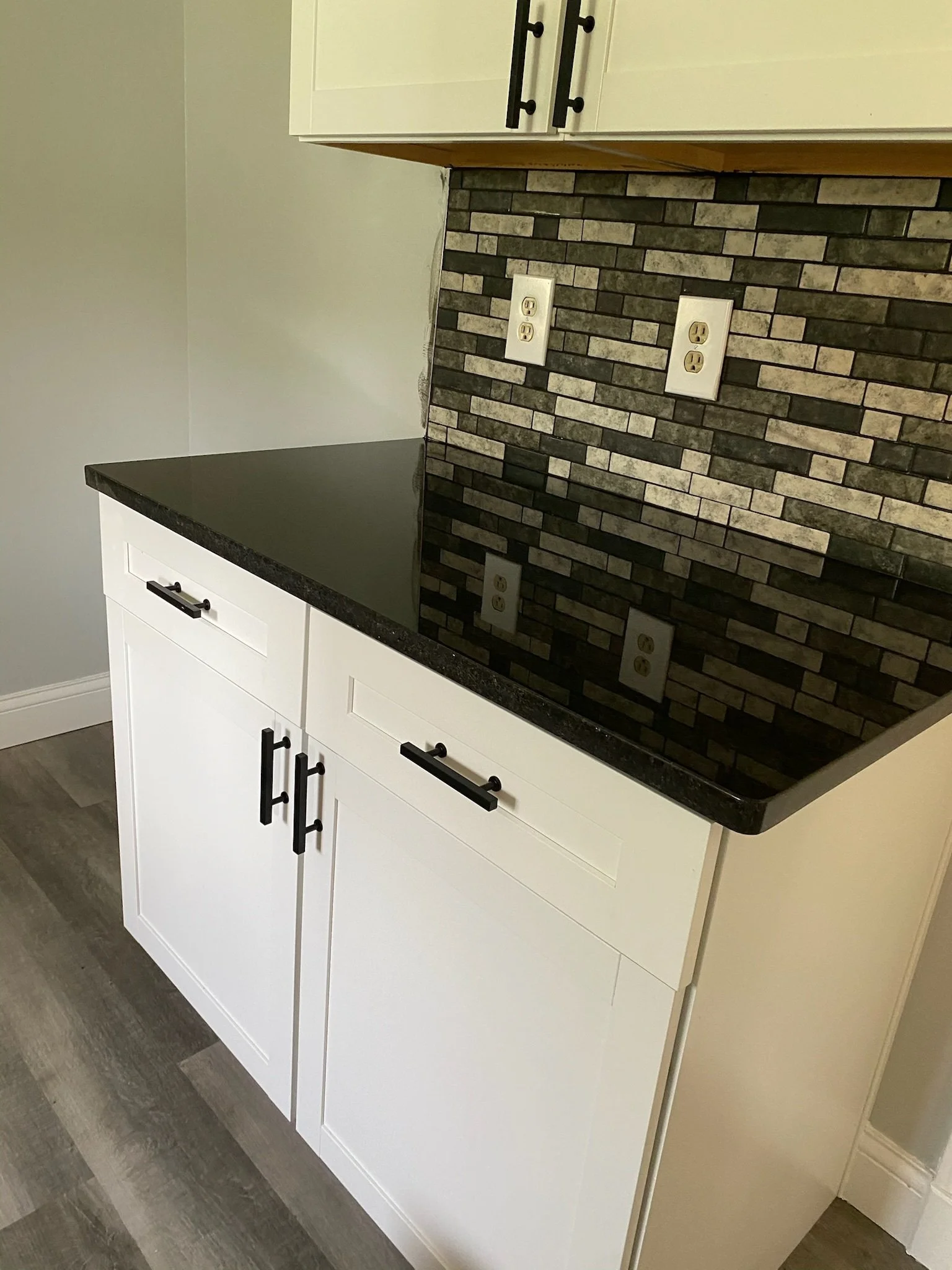 mosaic tile backsplash Dayton Ohio kitchen remodel dark accent tile and white cabinets