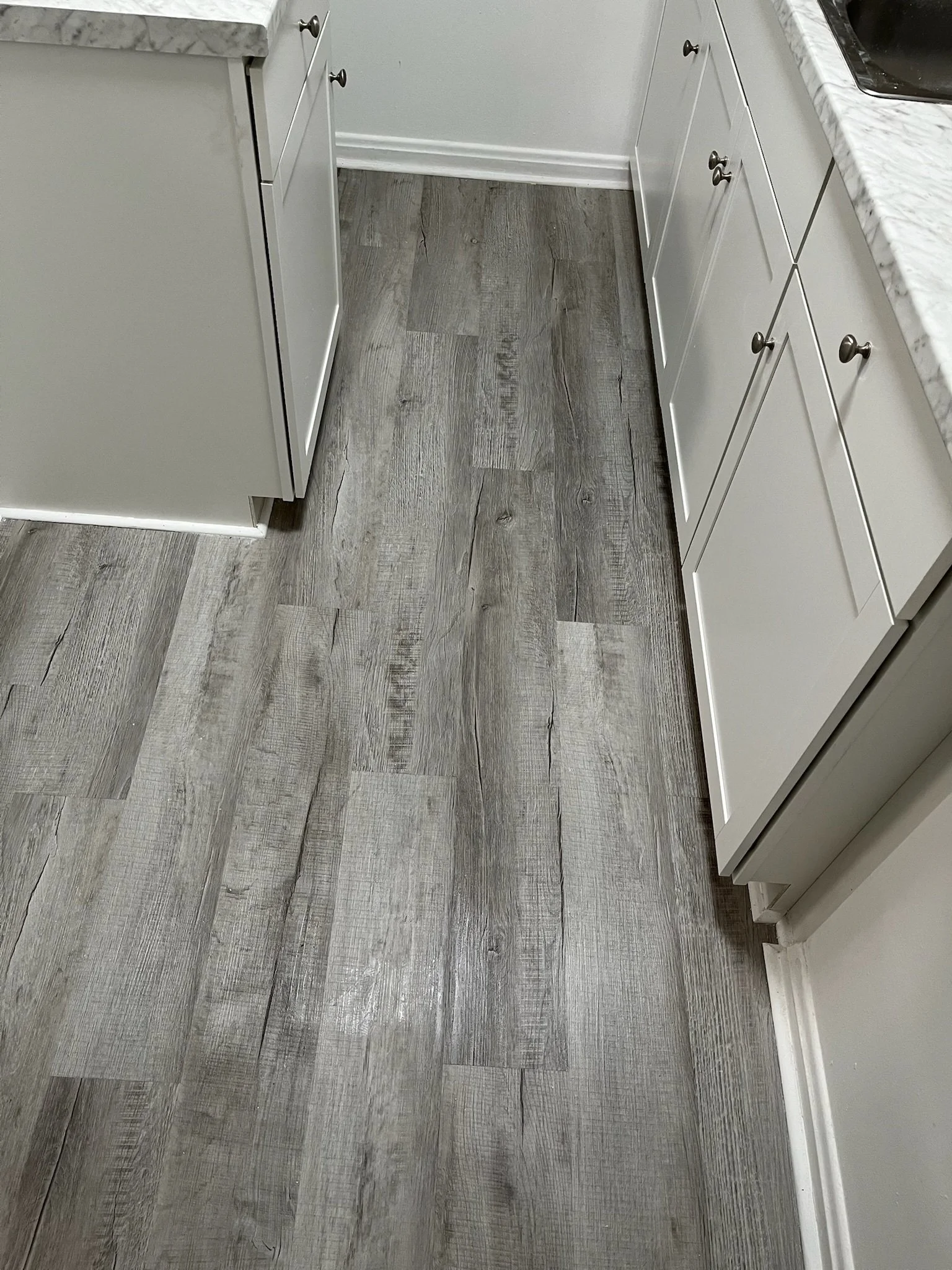 luxury vinyl plank flooring Dayton Ohio kitchen remodel waterproof gray flooring installation
