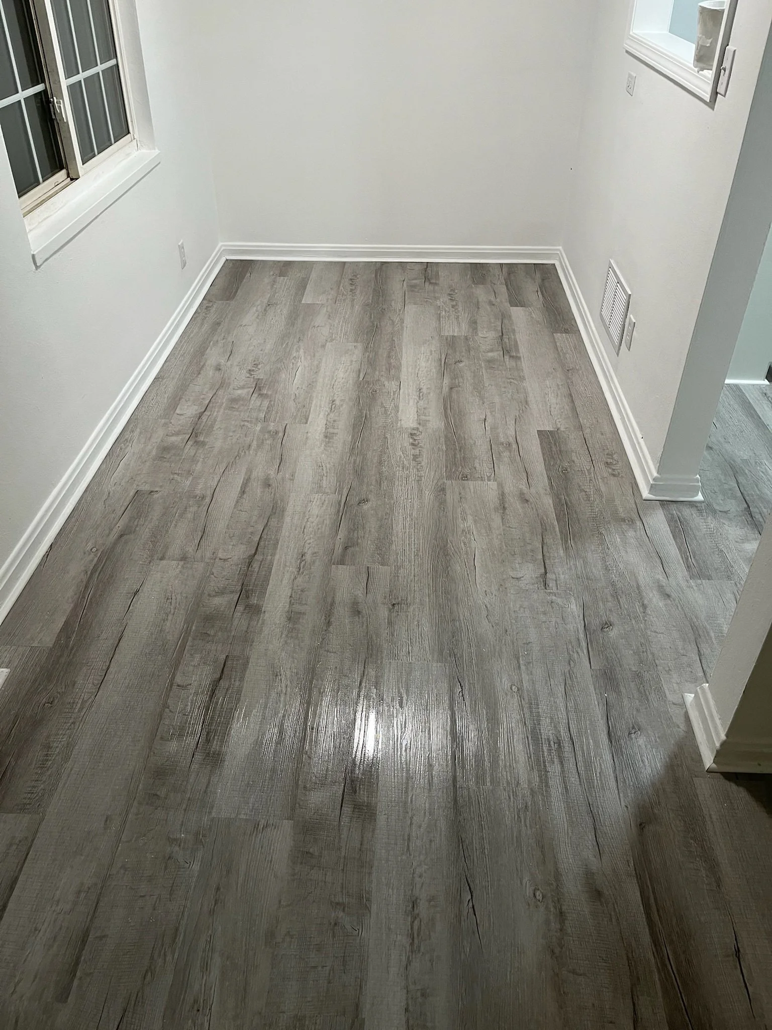 vinyl plank flooring Dayton Ohio kitchen upgrade durable scratch resistant gray wood flooring